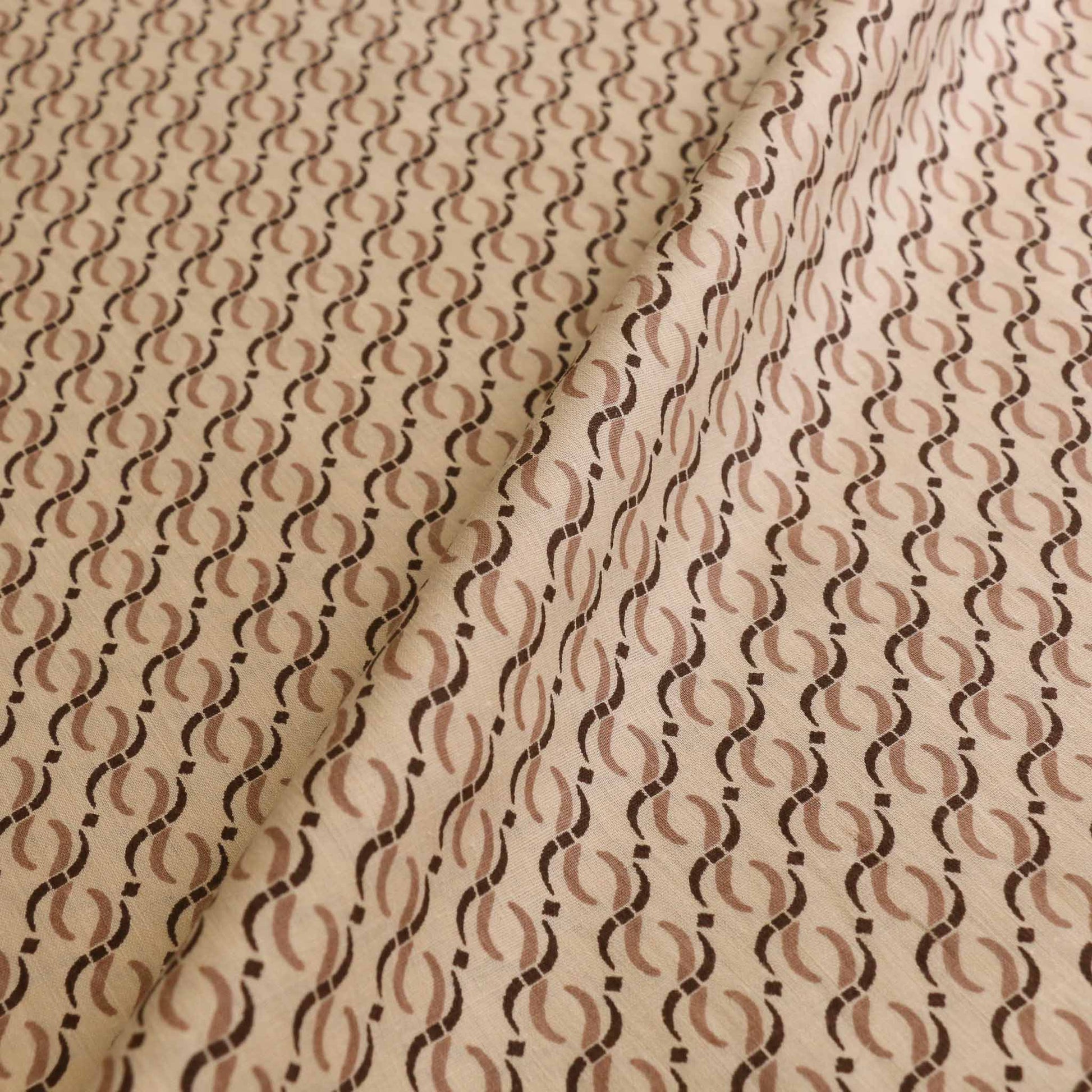 cream vintage cotton dressmaking sustainable deadstock fabric with beige brown geometric pattern