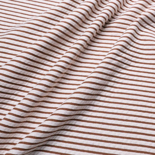 jersey knit viscose dressmaking fabric with beige and white stripe