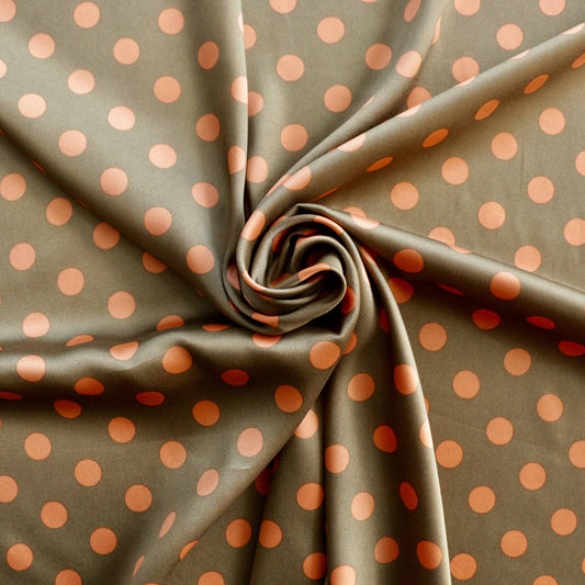 beige and peach polka dot satin dressmaking fabric
