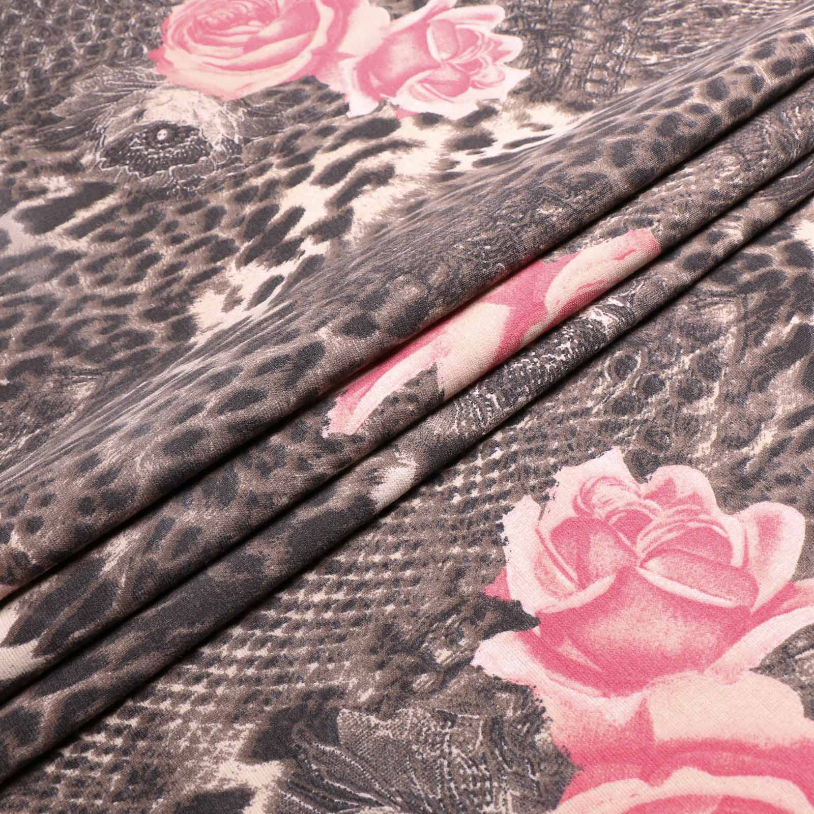 pink and brown animal printed ponte roma jersey fabric for dressmaking leopard skin