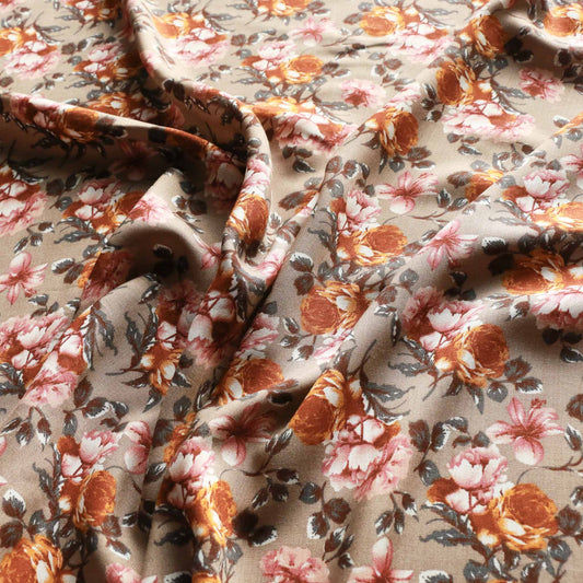 viscose rayon challis dressmaking fabric with floral print on pale brown colour