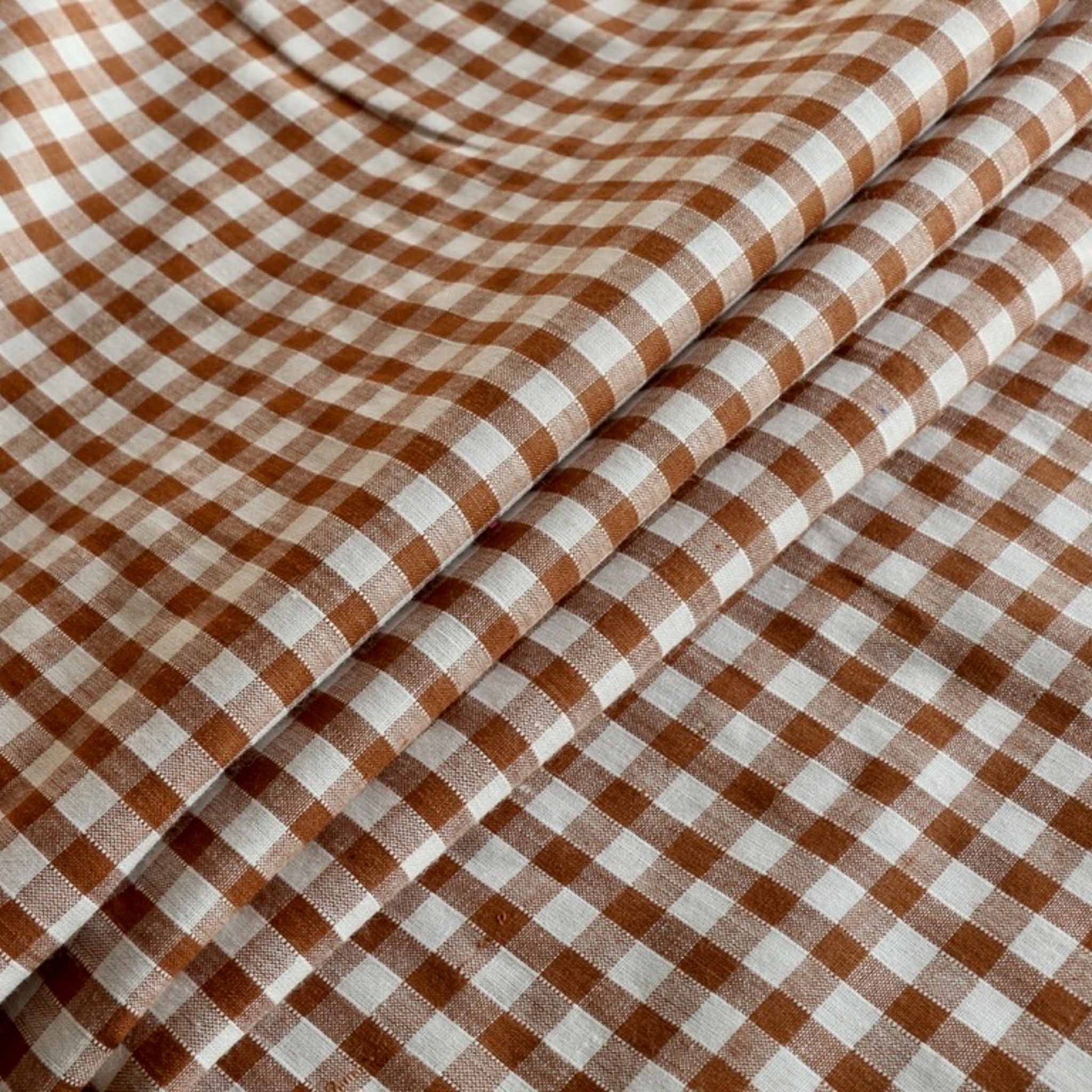 retro vintage sustainable cotton dressmaking fabric with classic gingham pattern in brown and beige