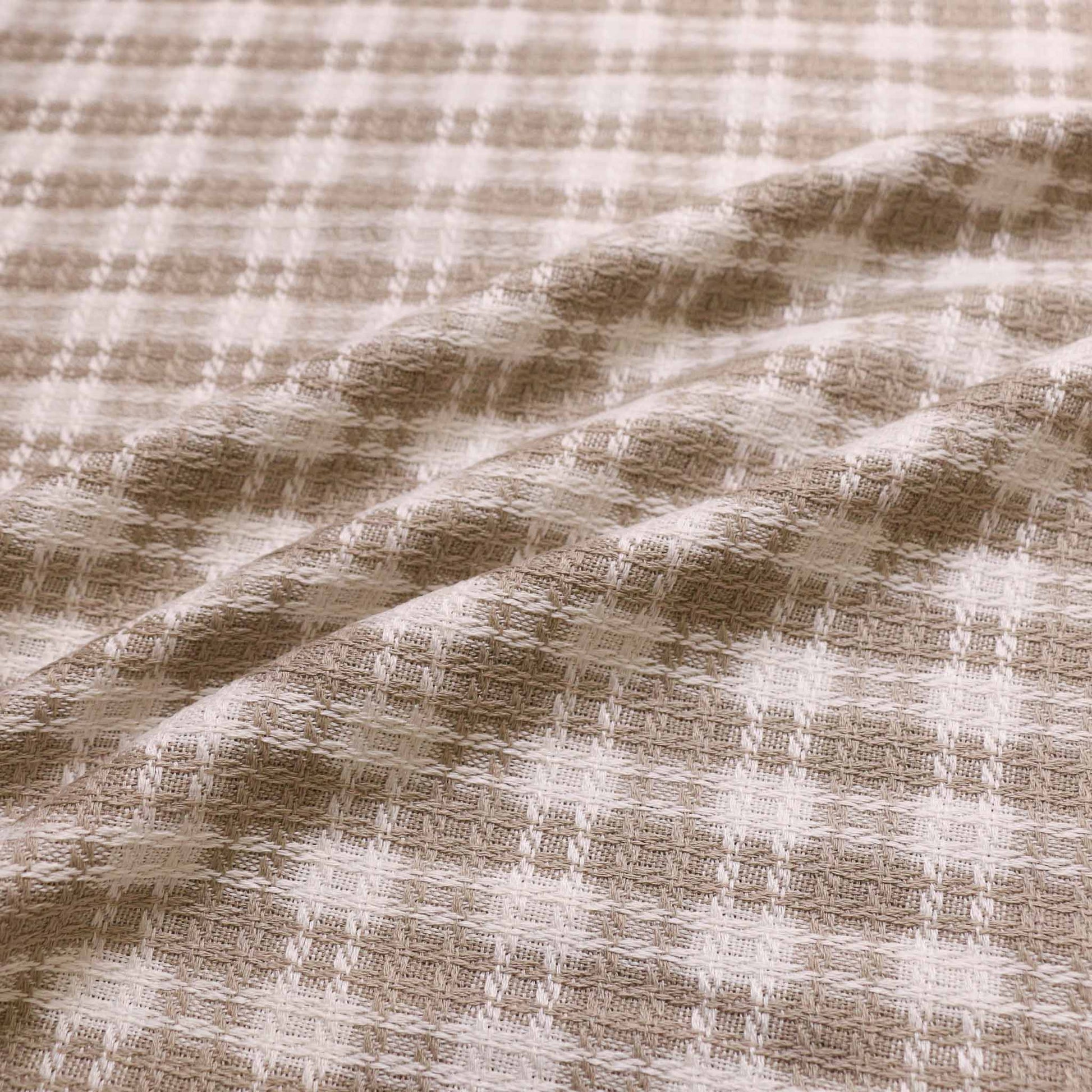 beige and white wool blend boucle dressmaking fabric with check pattern