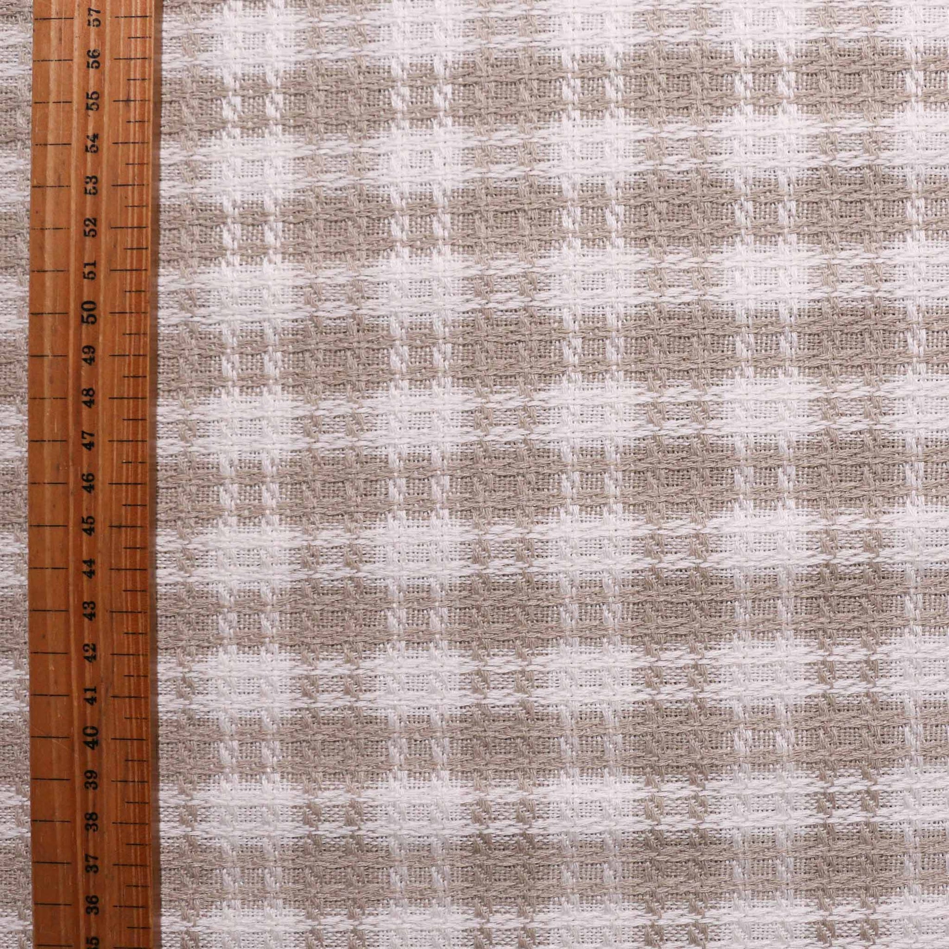 beige and white boucle dressmaking wool blend fabric with checkered pattern