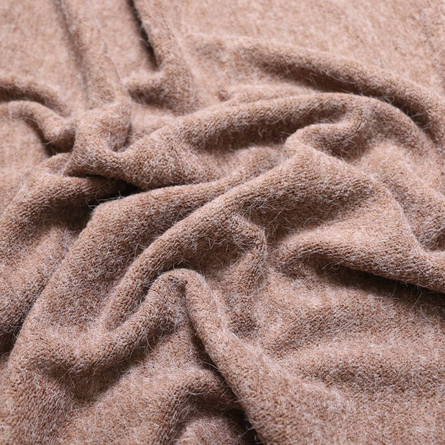 faux angora jersey beige colour dressmaking fabric