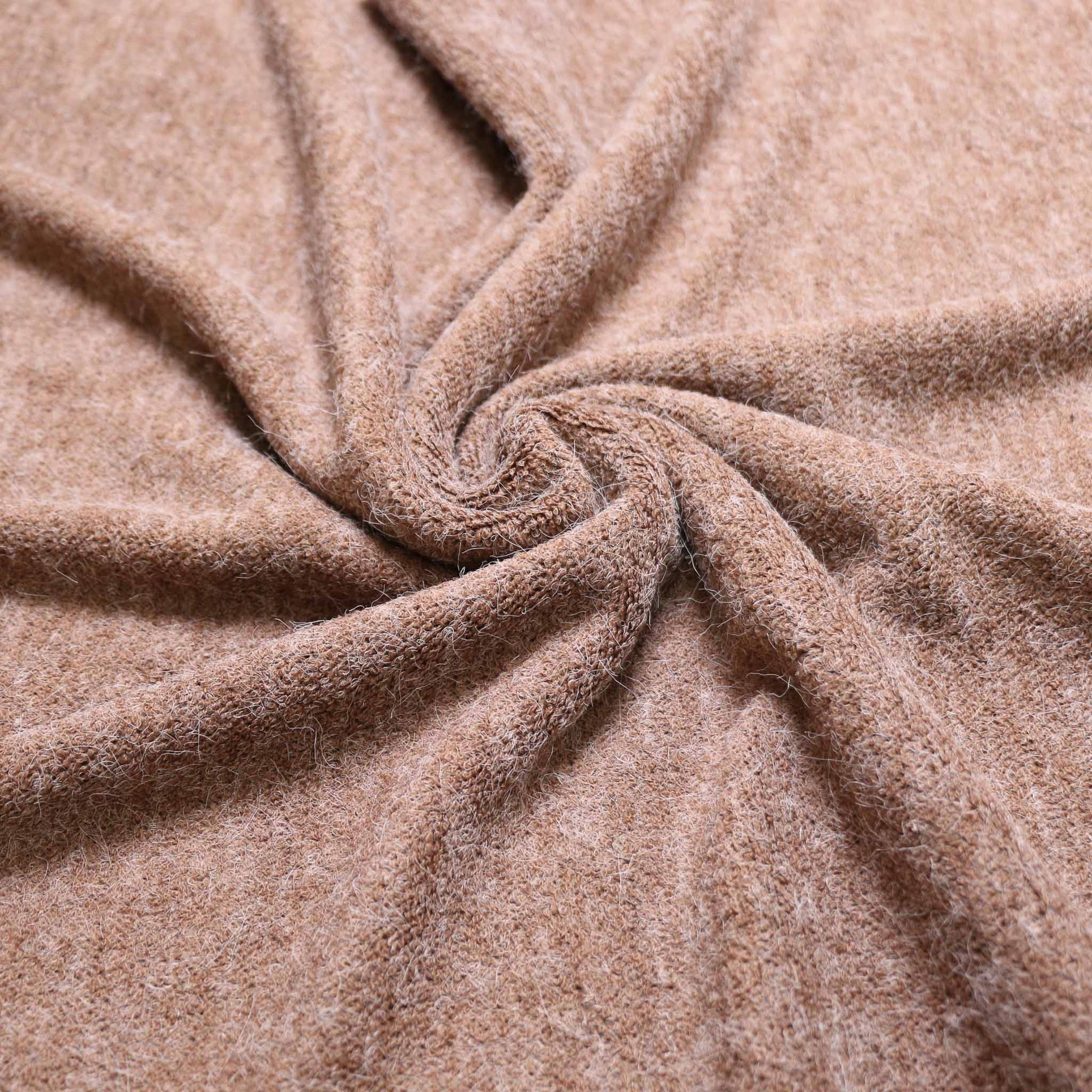 beige angora wool jersey knit dressmaking fabric