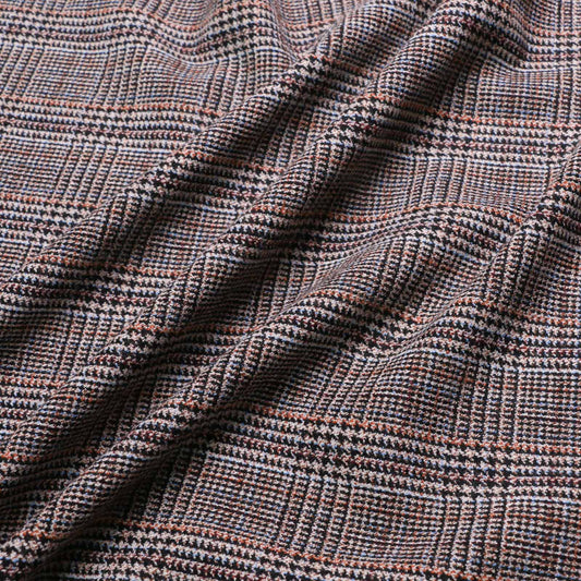 stretchy wool suiting fabric with prince of wales check pattern in beige