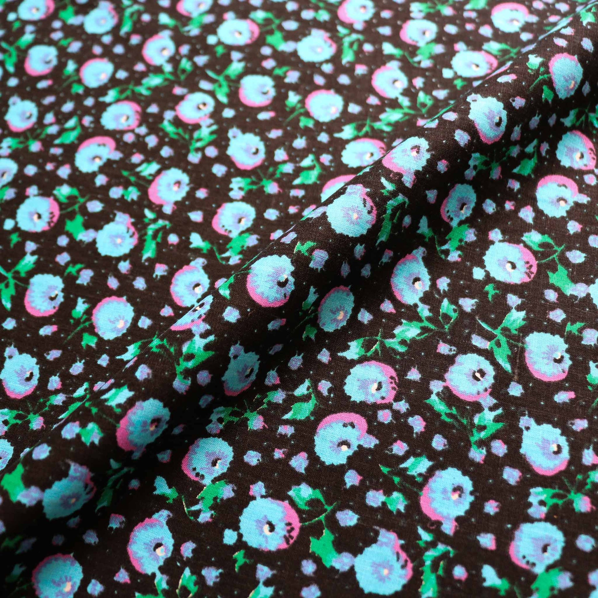 vintage cotton dressmaking fabric in black with blue pink floral print