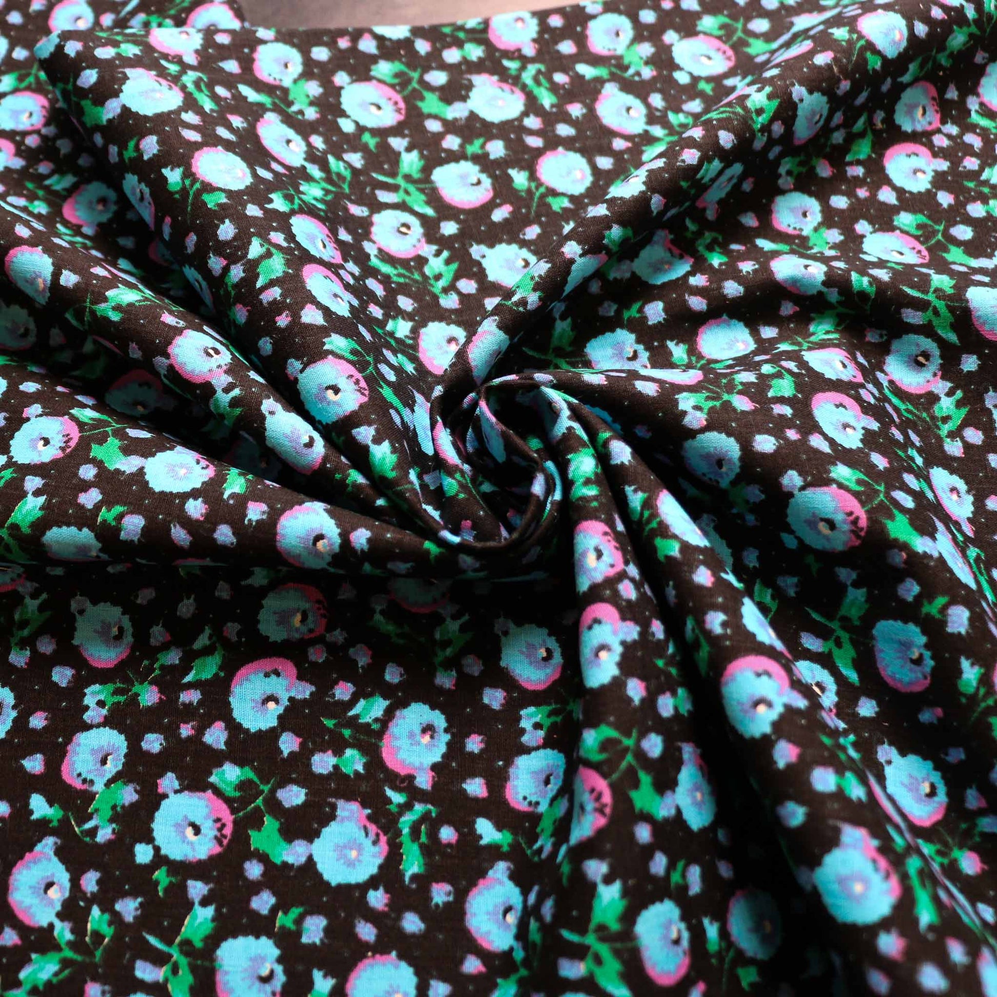 black sustainable vintage cotton dressmaking poplin fabric with blue floral print