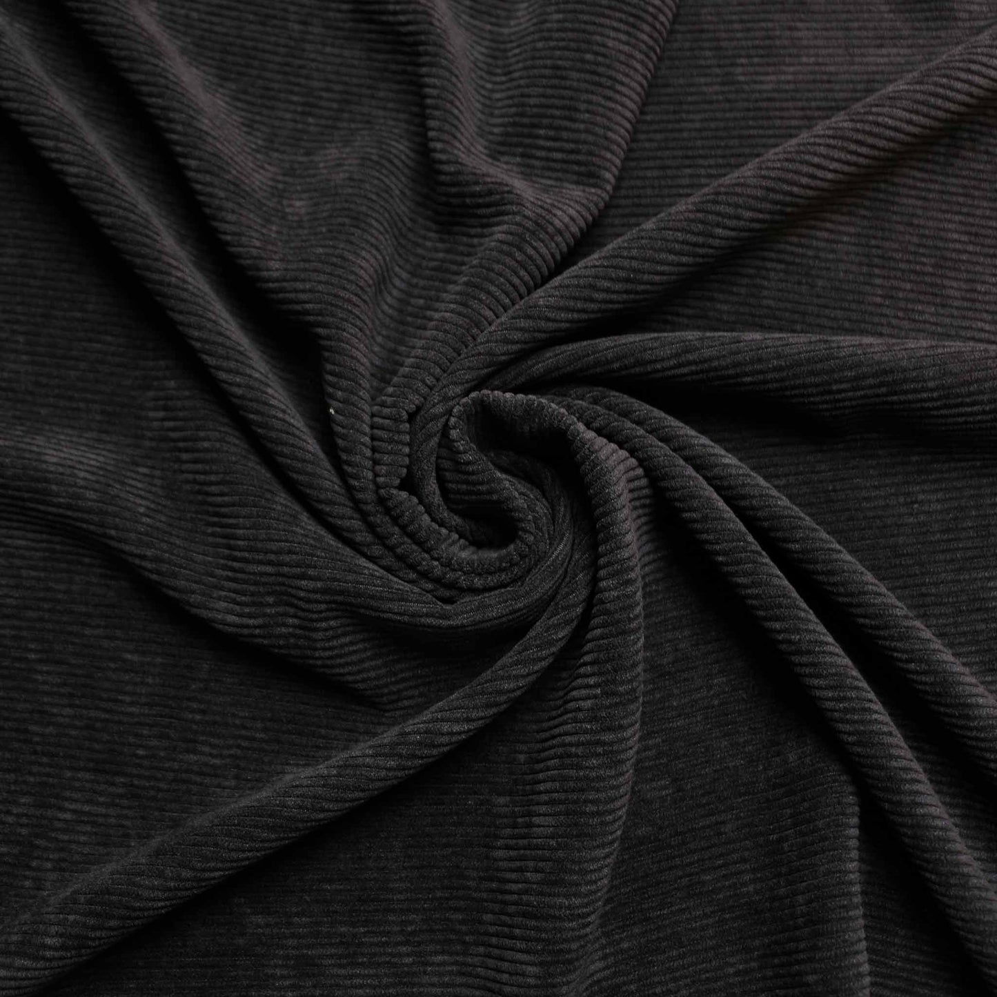 jumbo corduroy dressmaking fabric in black colour