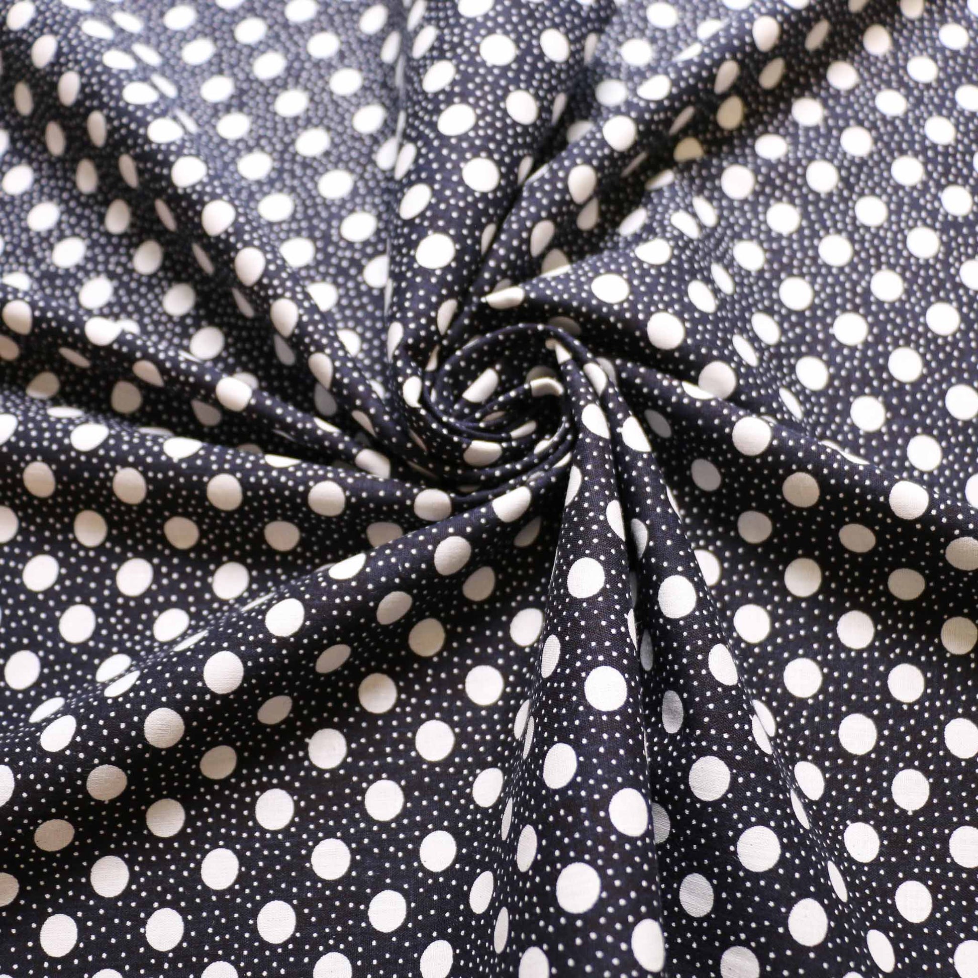 vintage cotton dressmaking fabric in black with white dot print