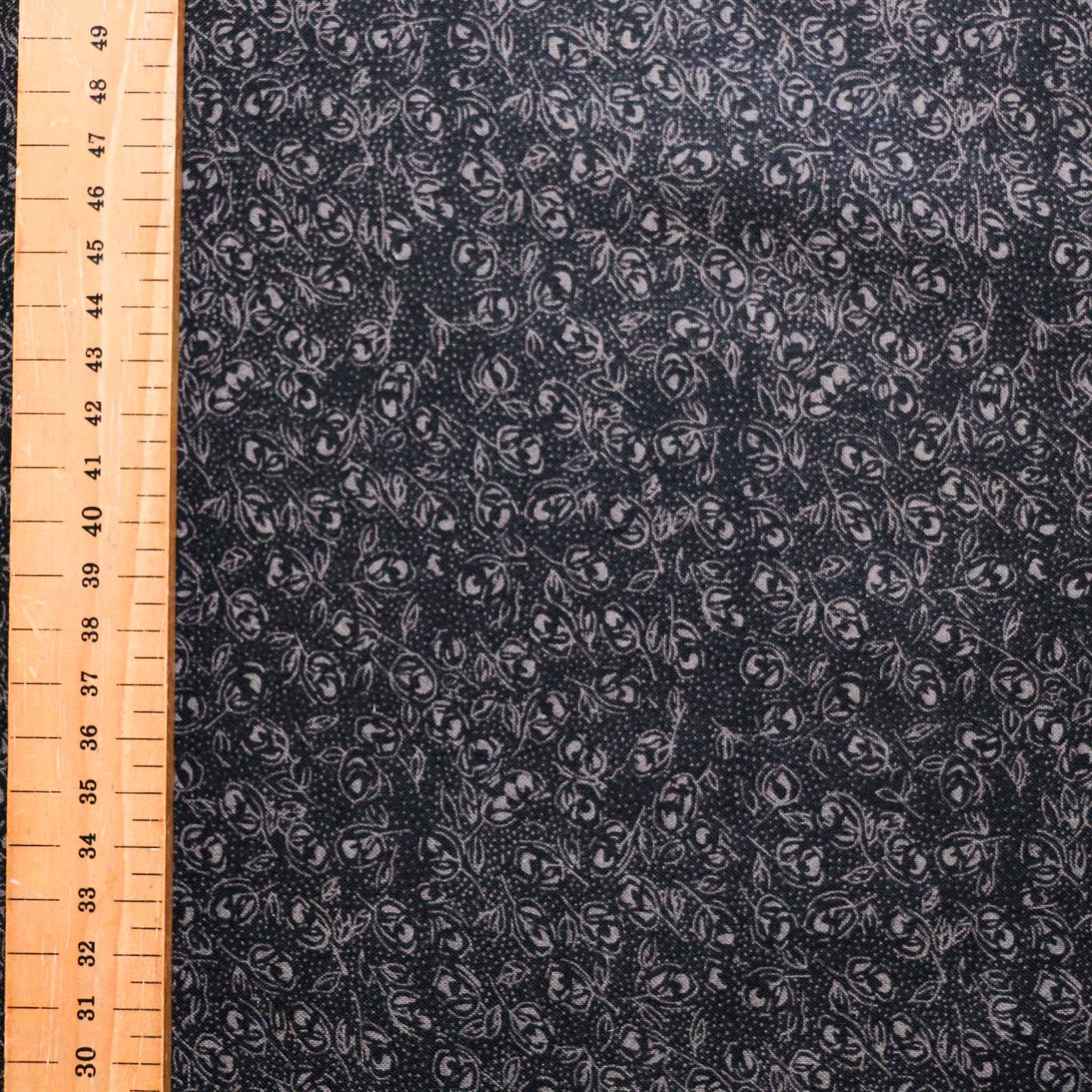 black vintage cotton dressmaking sustainable deadstock fabric with grey ditsy floral print