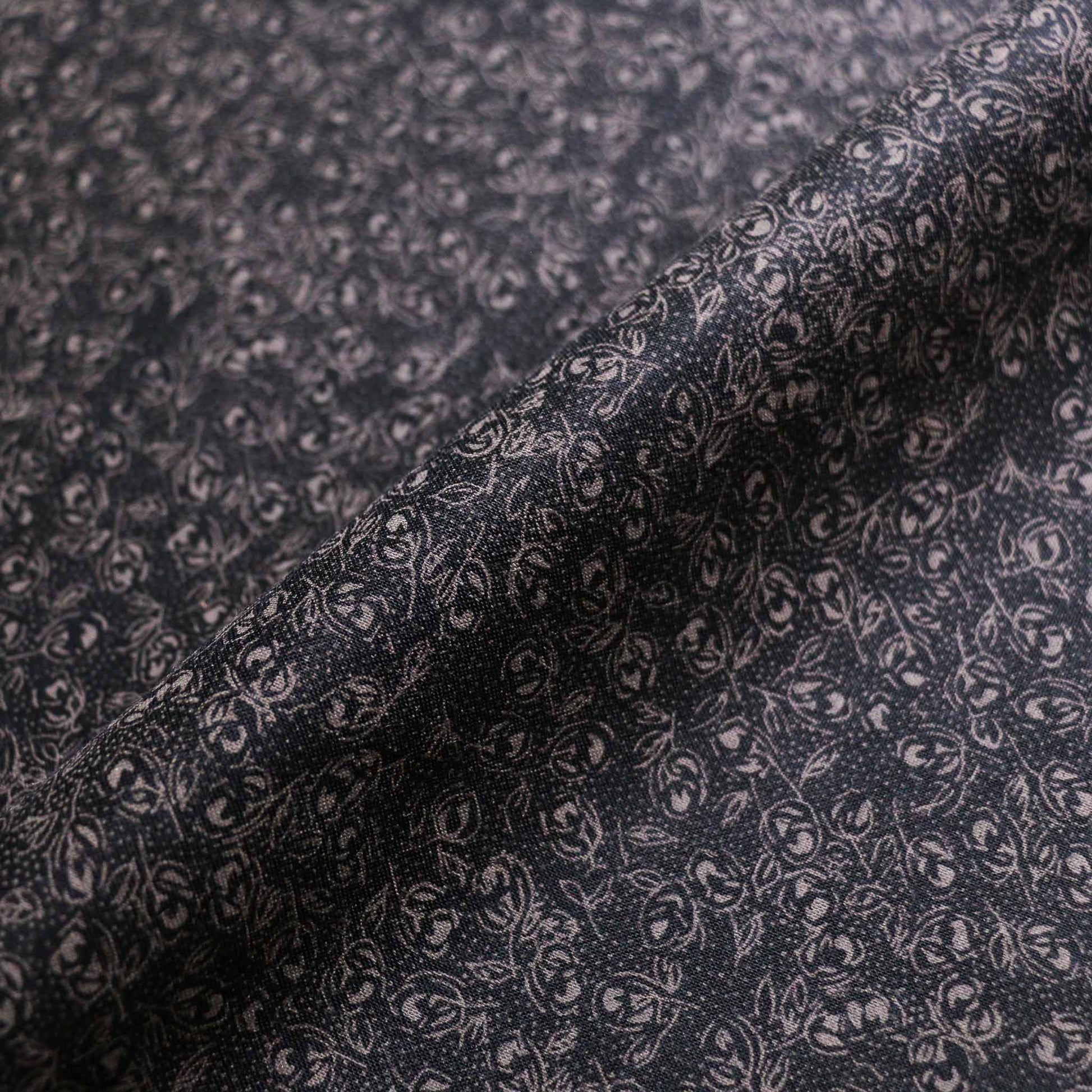 black sustainable vintage cotton dressmaking poplin fabric with small grey floral print