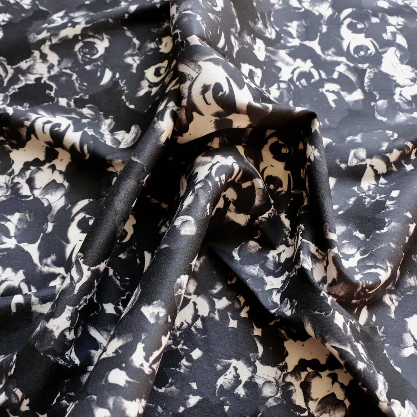 stretchy floral cotton sateen dressmaking fabric in grey and black