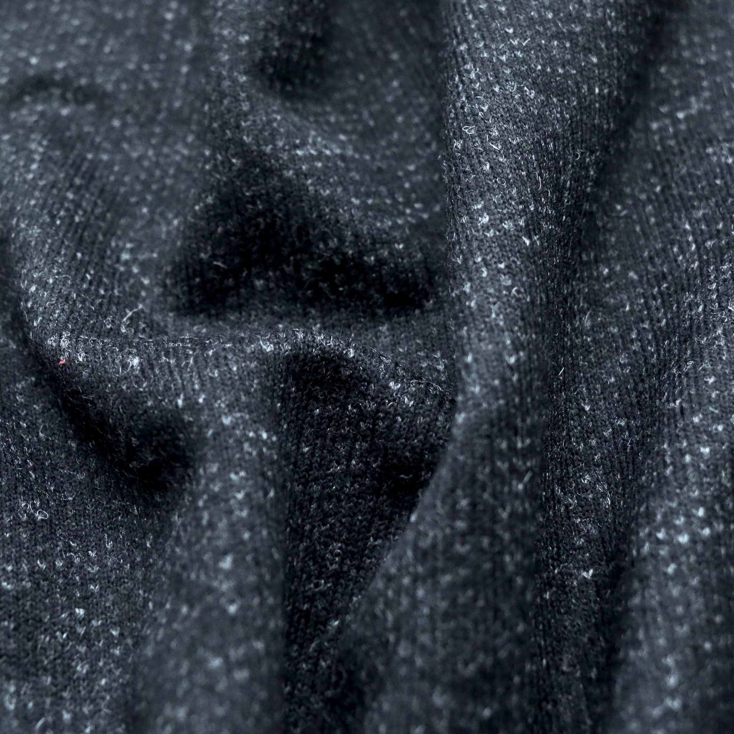 black and grey wool jersey knit dressmaking fabric with felt backing 