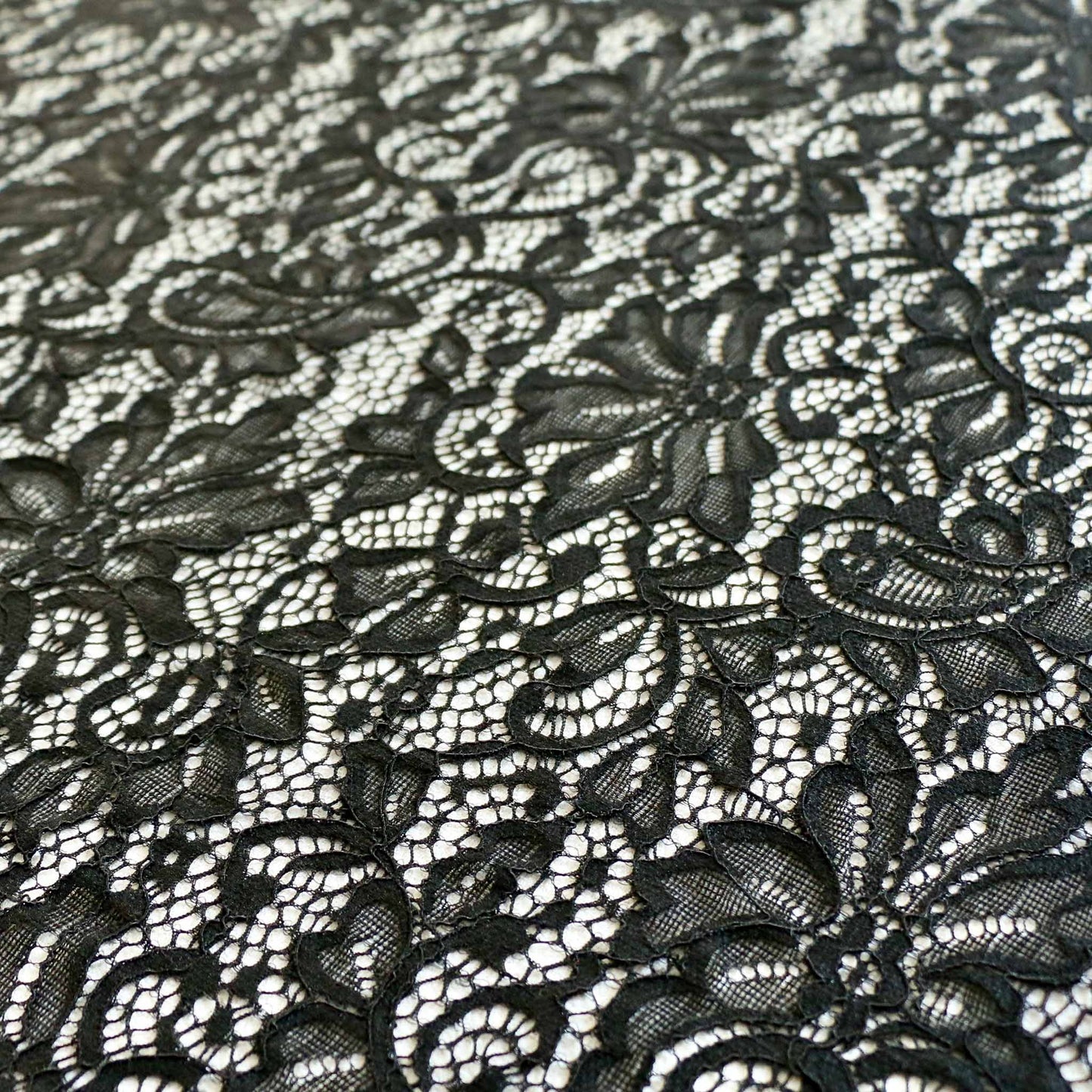 corded black stretchy dressmaking lace fabric