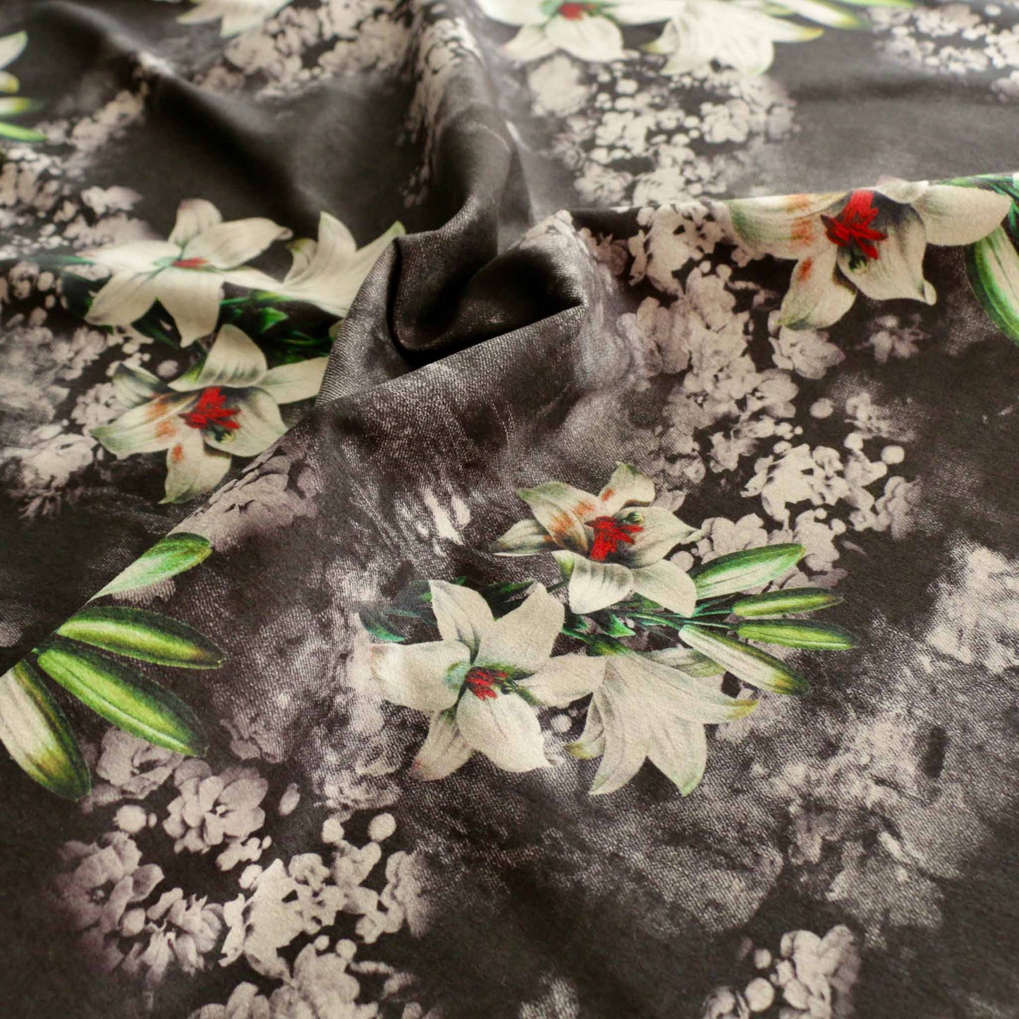 floral white lily flower design on black moleskin suede dressmaking fabric
