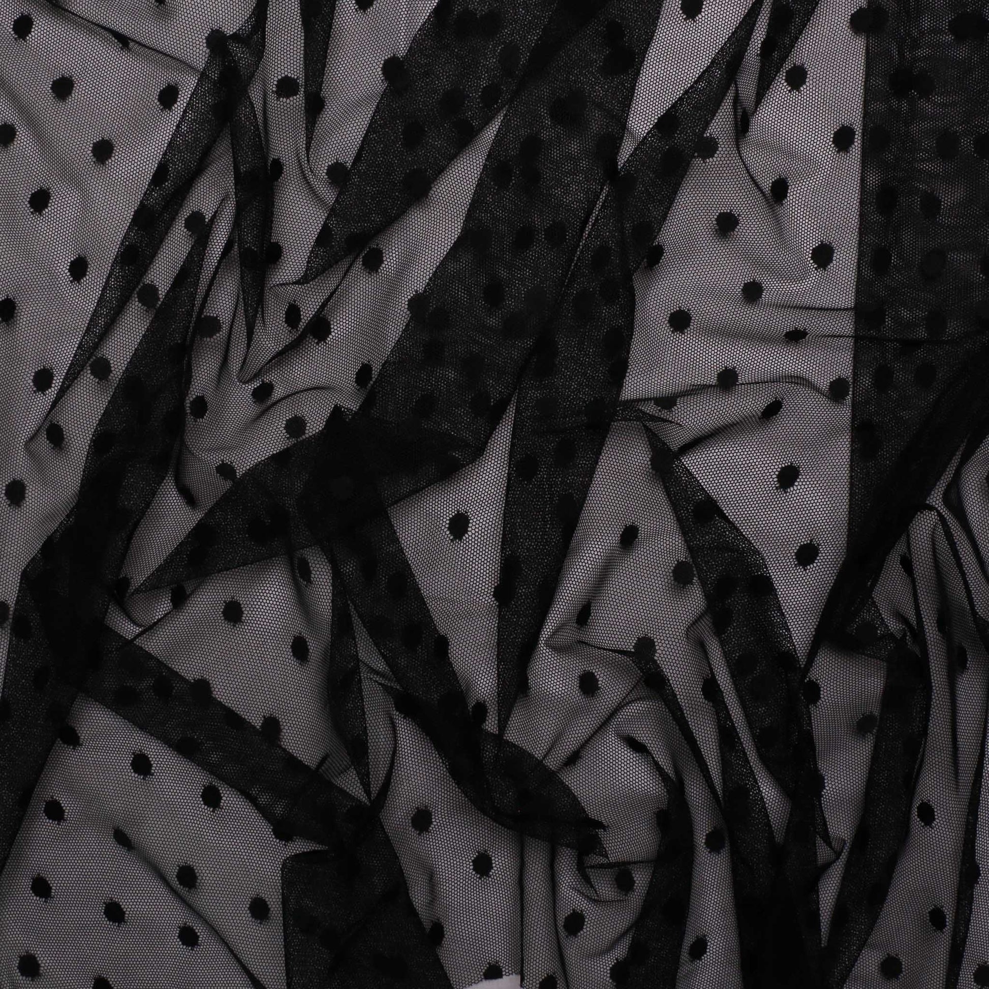 black dressmaking netting fabric with polka dot pattern