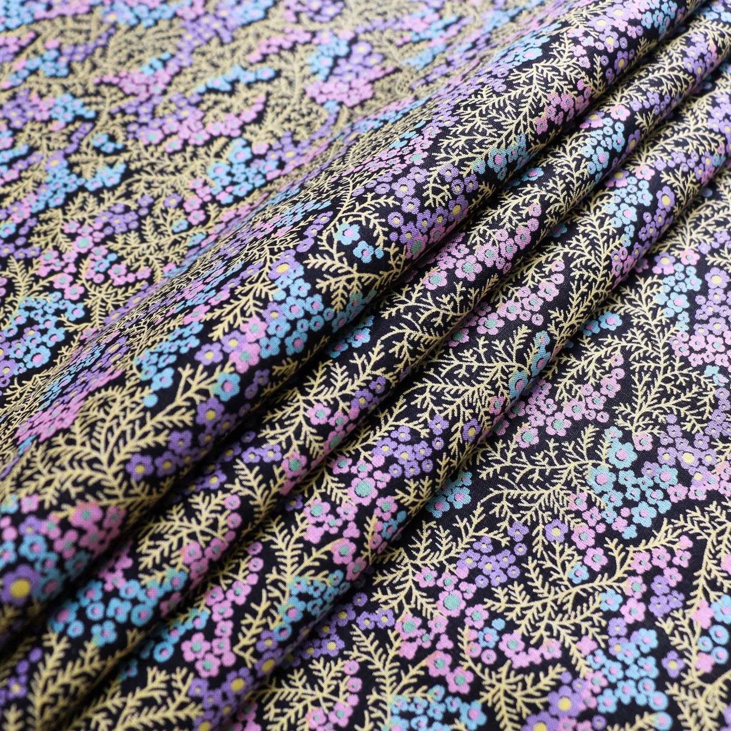 sustainable vintage black cotton poplin dressmaking fabric with retro multicolourted floral print