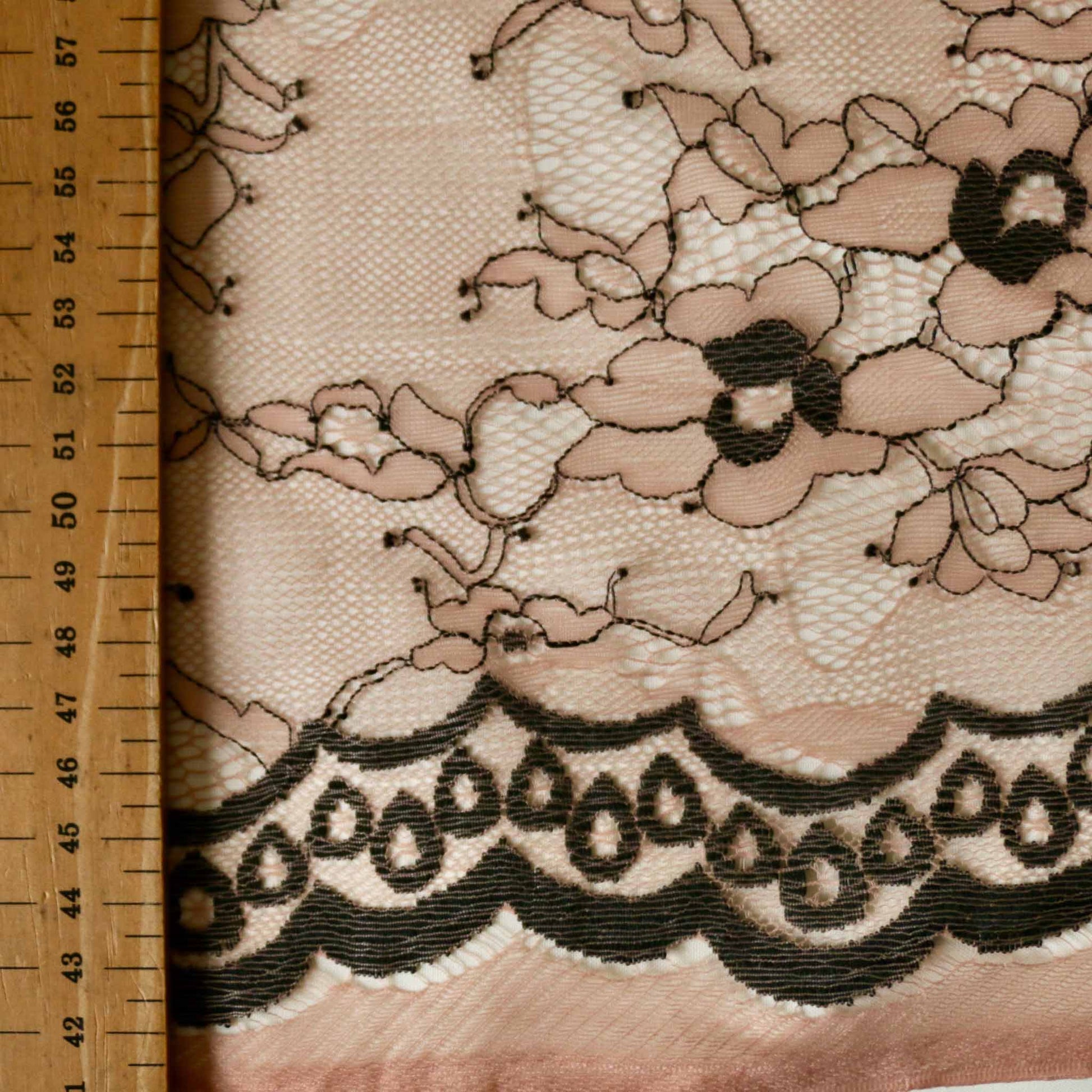 pink nylon delicate lace fabric with floral black design for dressmaking