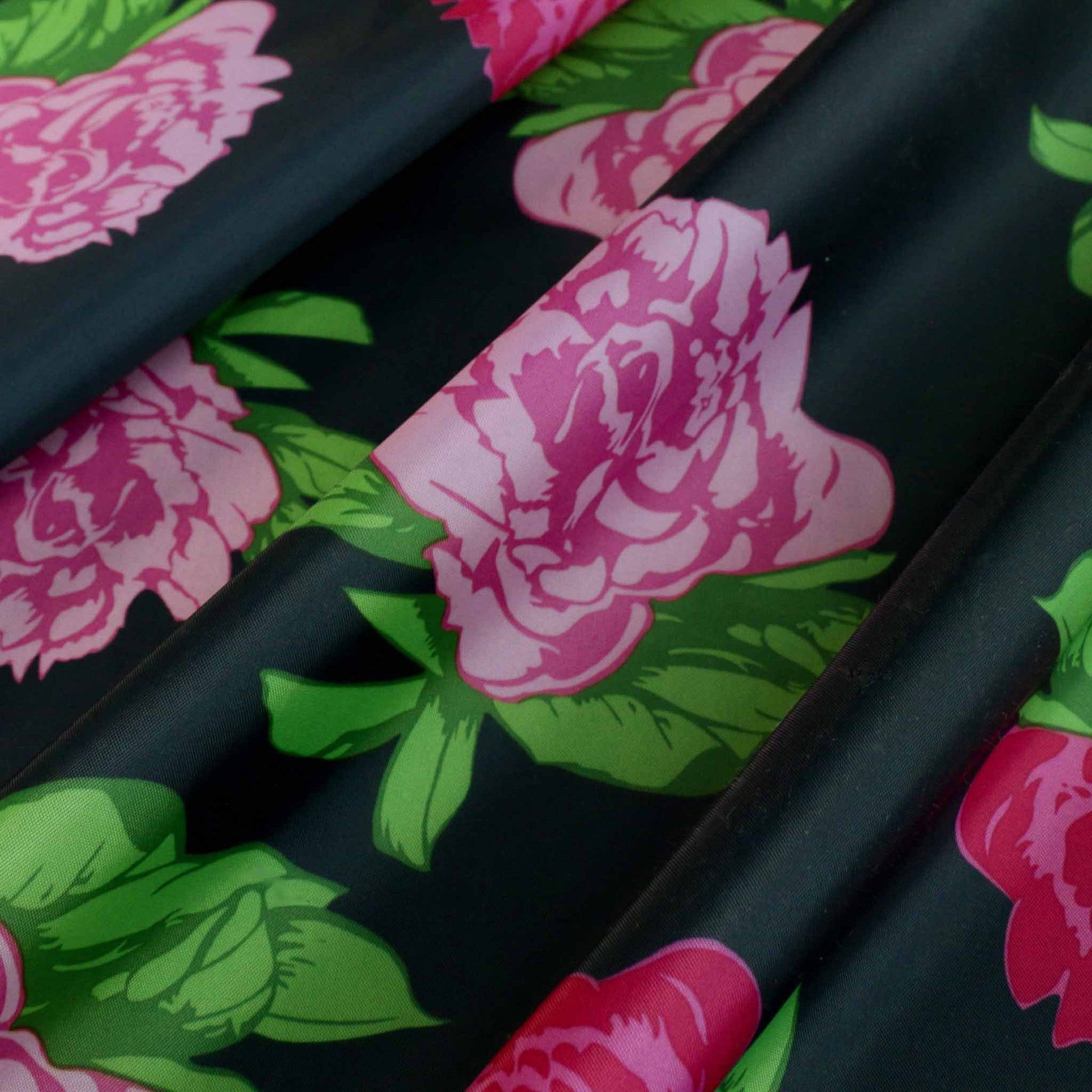 black polyester lining fabric with large pink roses design