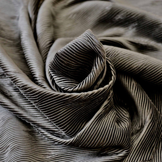 black stretchy plisse dressmaking fabric with stripes design