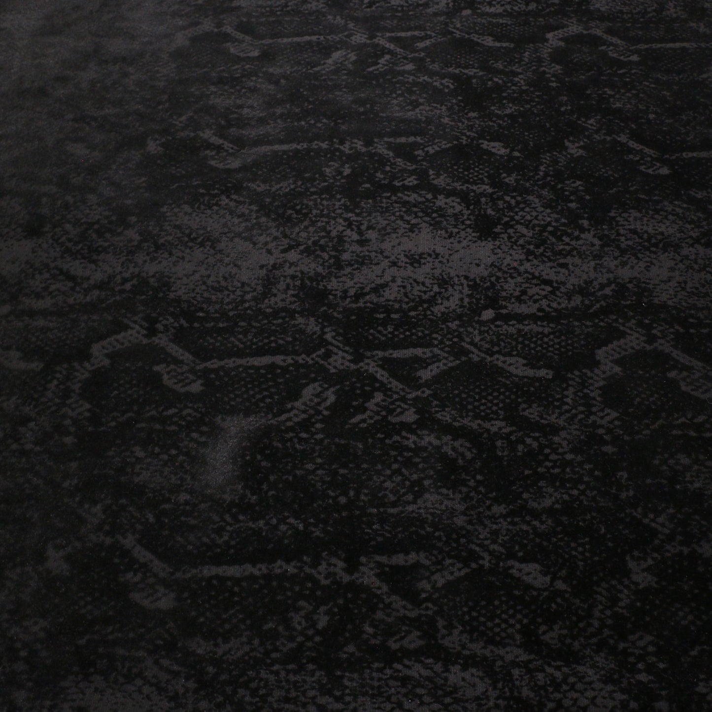 black ponte roma fabric with snake skin pattern