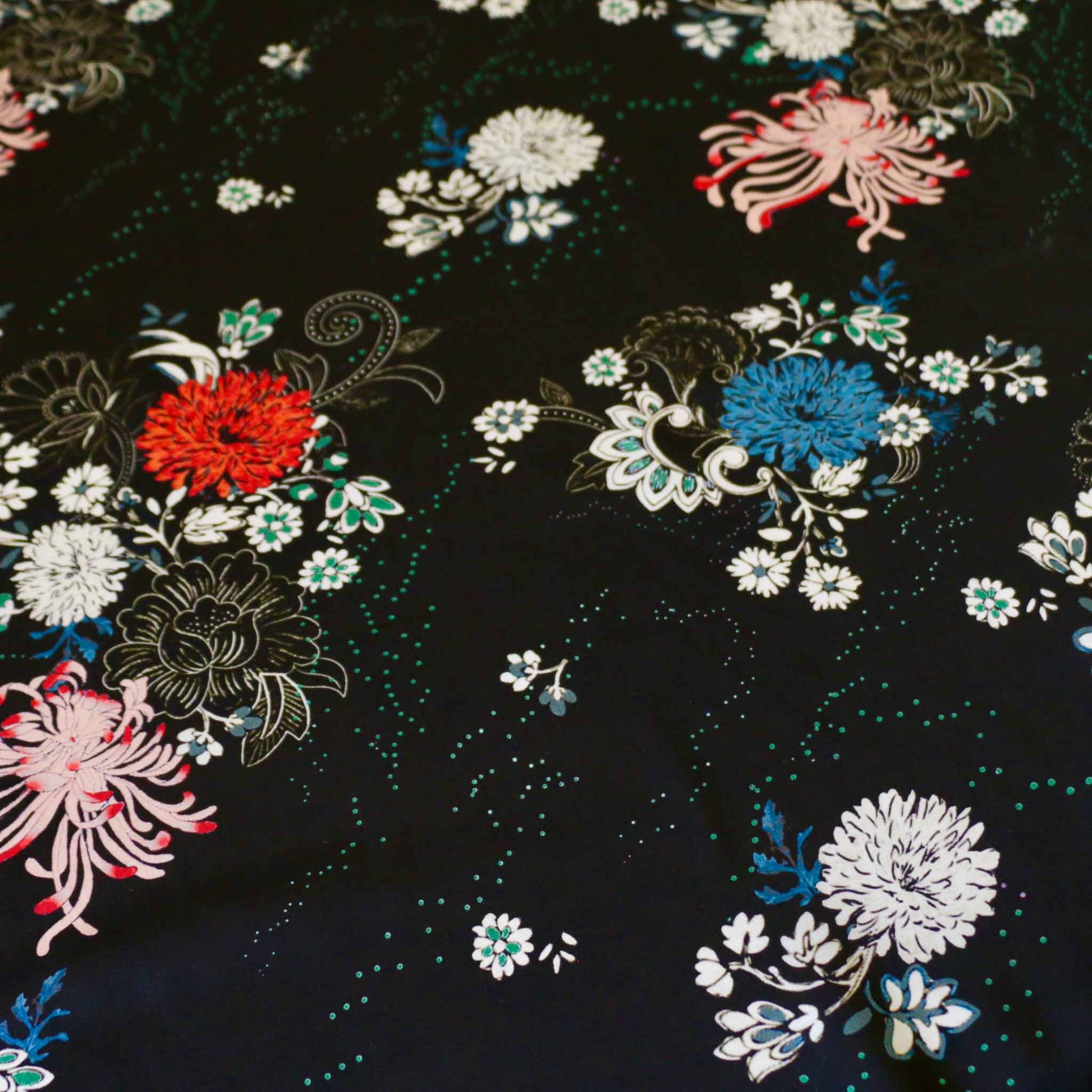 black viscose rayon challis dressmaking fabric with multicoloured flowers 