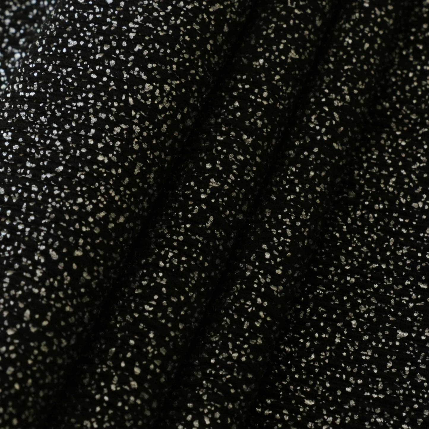 folder silver shimmer plisse design dot fabric in black