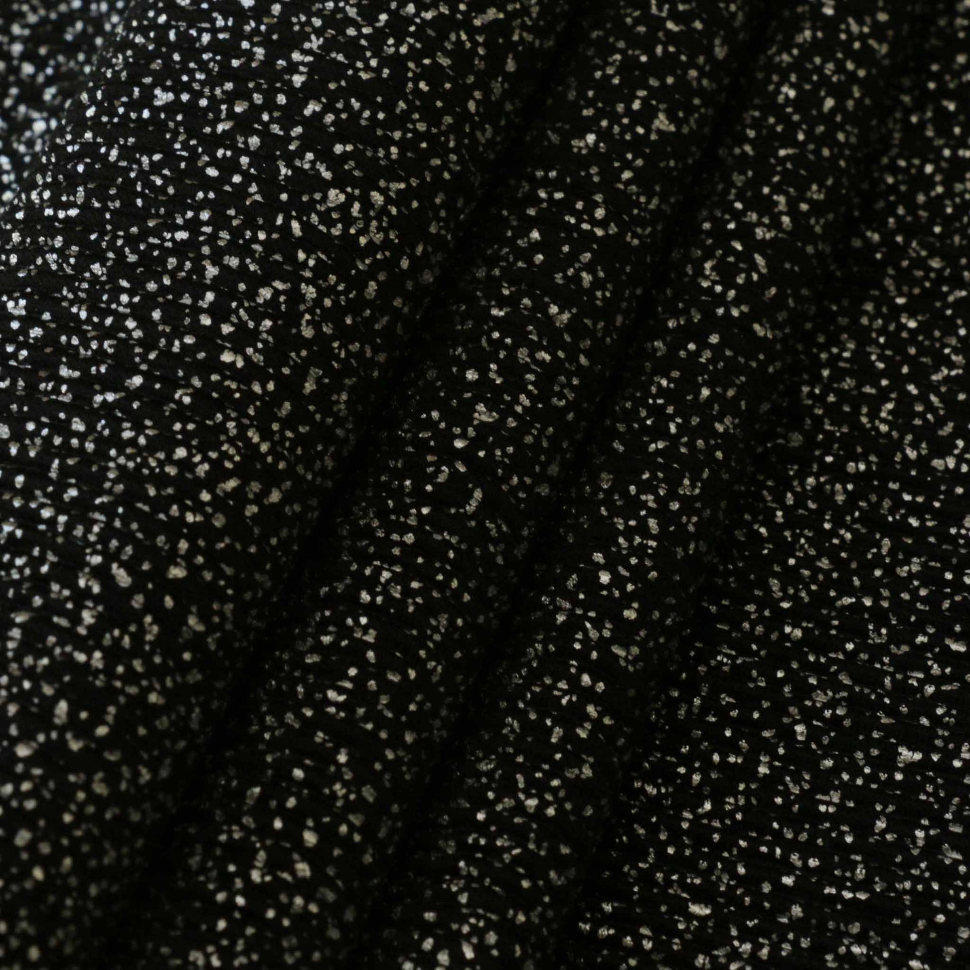folder silver shimmer plisse design dot fabric in black