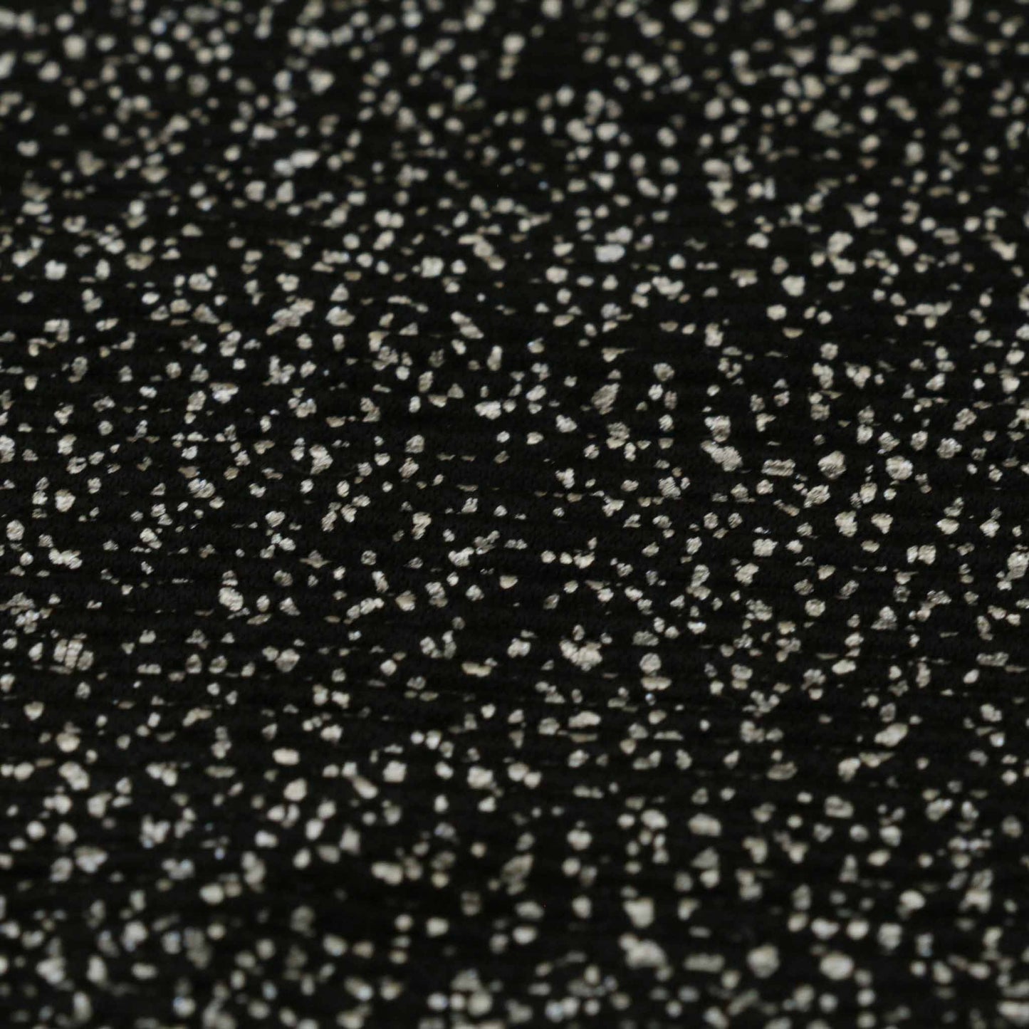 silver shimer dot speckled black plisse dressmaking fabric