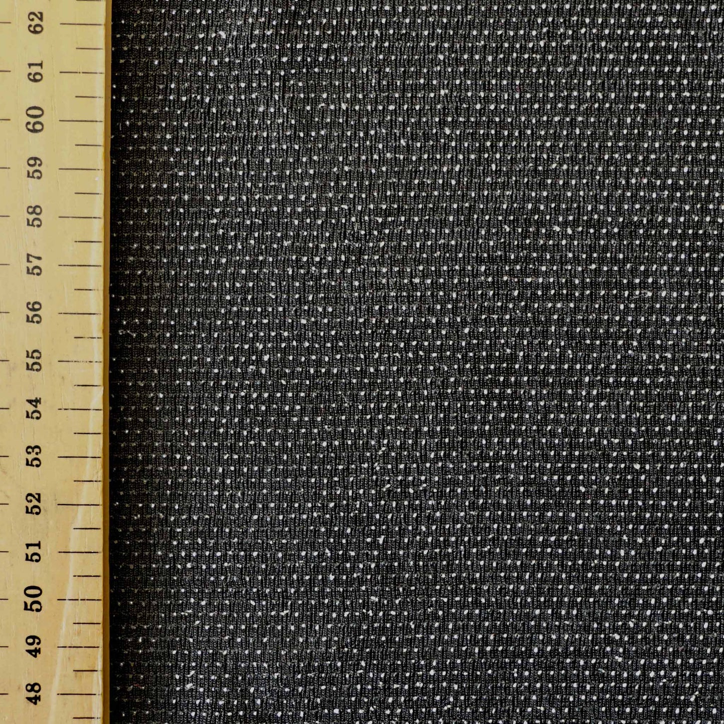 metre black and silver dotted slinky stretchy jersey dressmaking fabric