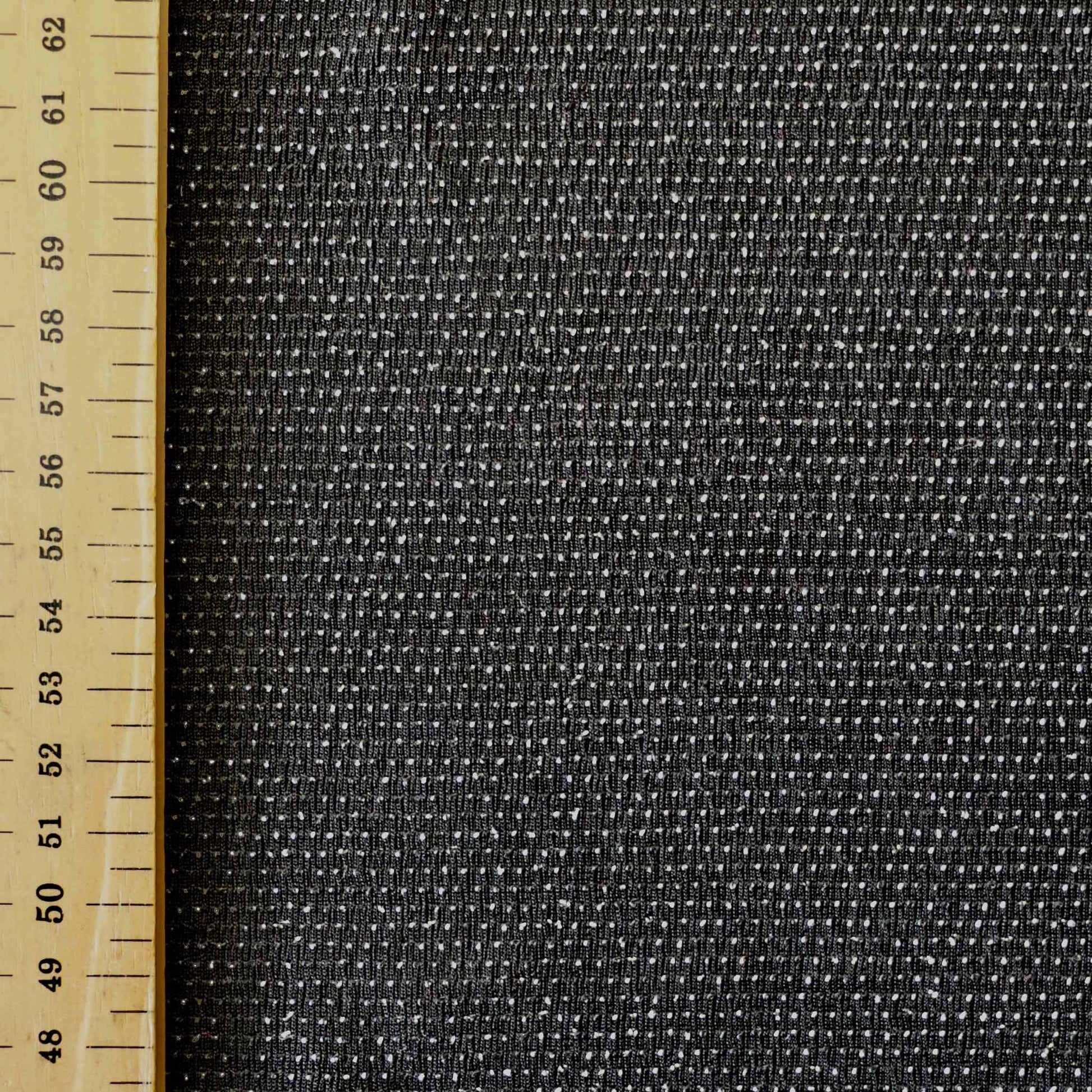 metre black and silver dotted slinky stretchy jersey dressmaking fabric