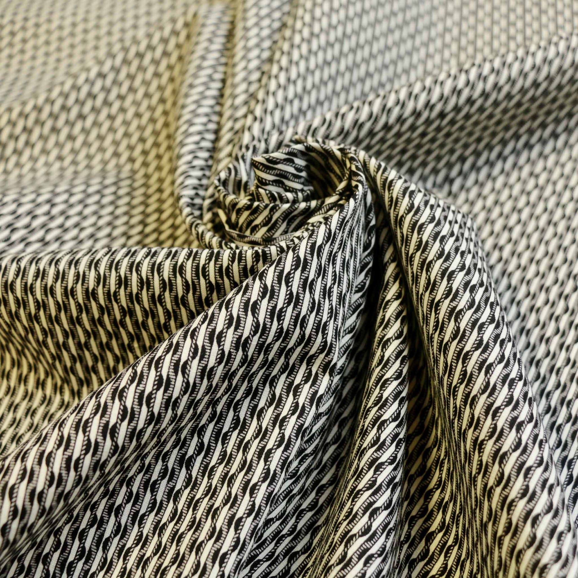 black and white vintage cotton poplin with retro stripe pattern for sustainable sewing