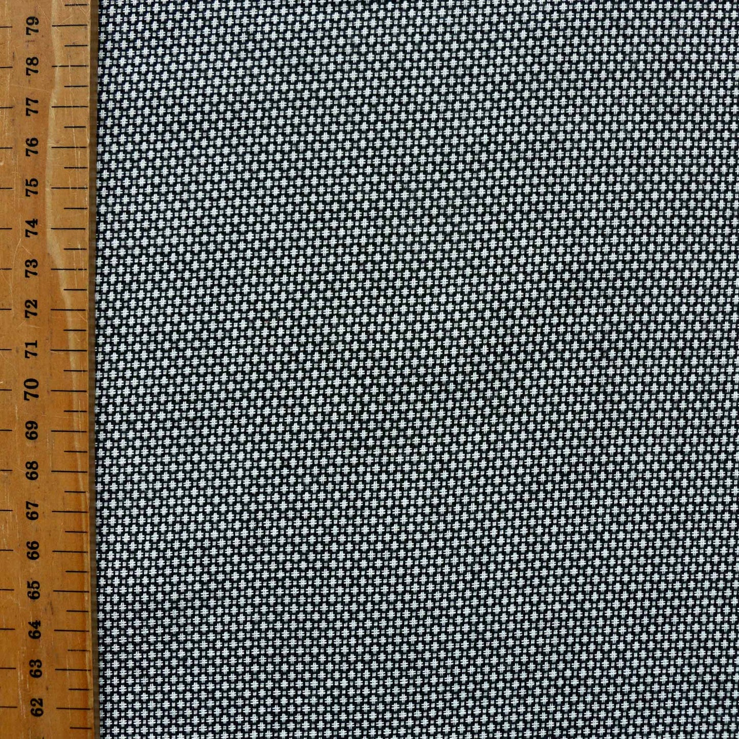 metre black polyviscose suiting fabric for dressmaking with white jacquard dot design