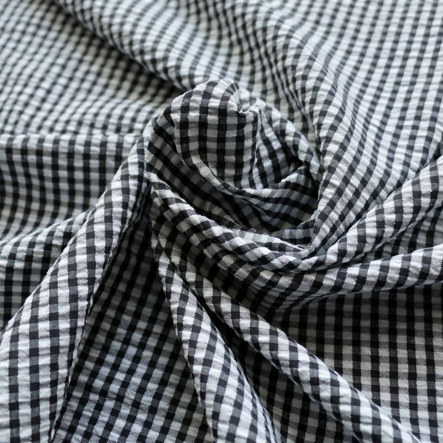 black and white gingham print seersucker dressmaking fabric