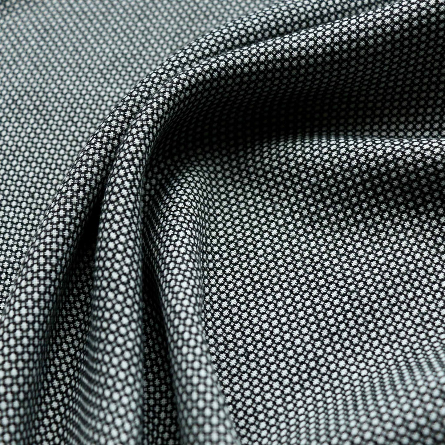 black and white polyviscose suiting dressmaking fabric with jacquard dots design