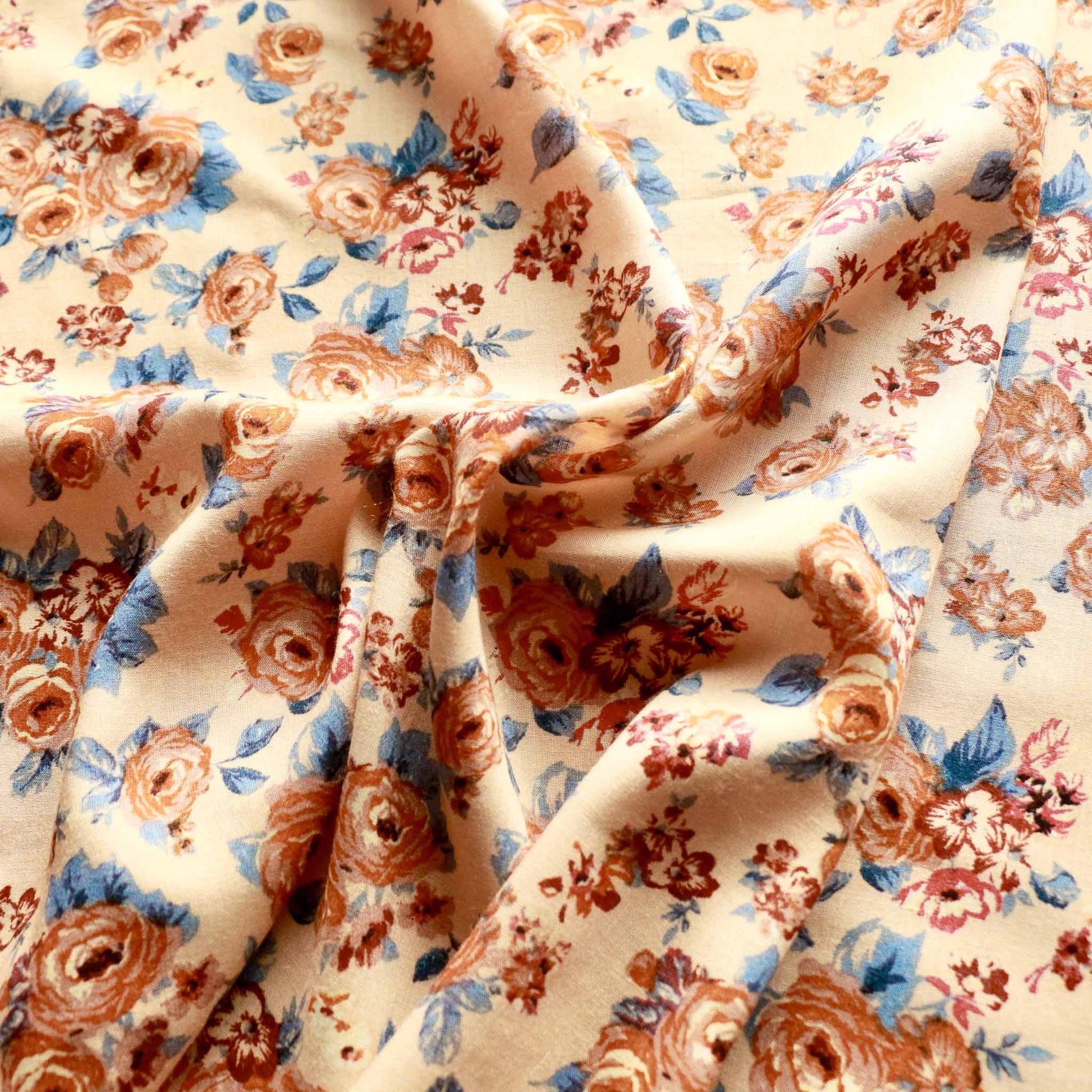 light beige viscose challis dressmaking rayon fabric with classical flowers printed in blue and brown