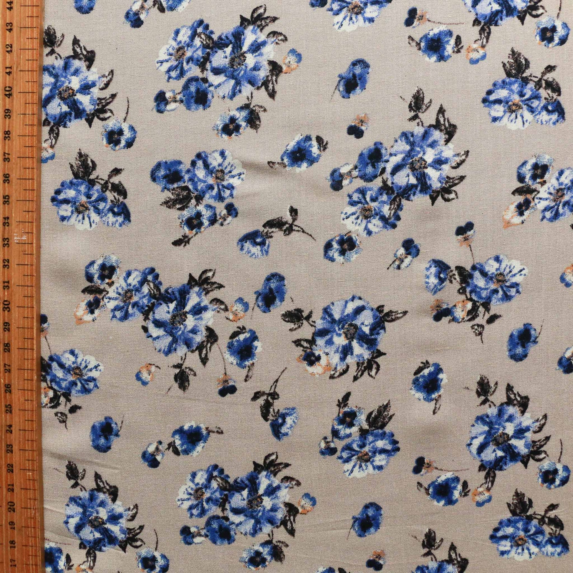 metre floral printed light beige viscose challis dressmaking fabric with blue flowers