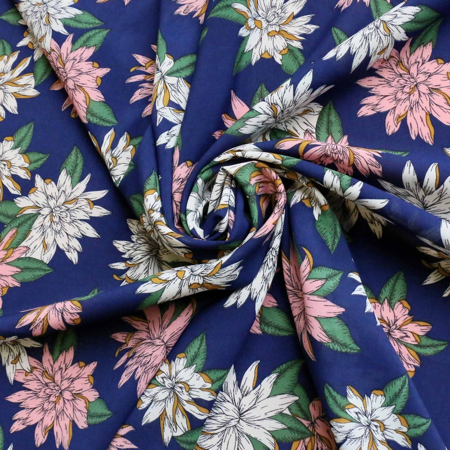 pink white and blue polyester chiffon stretchy dressmaking fabric with large floral print