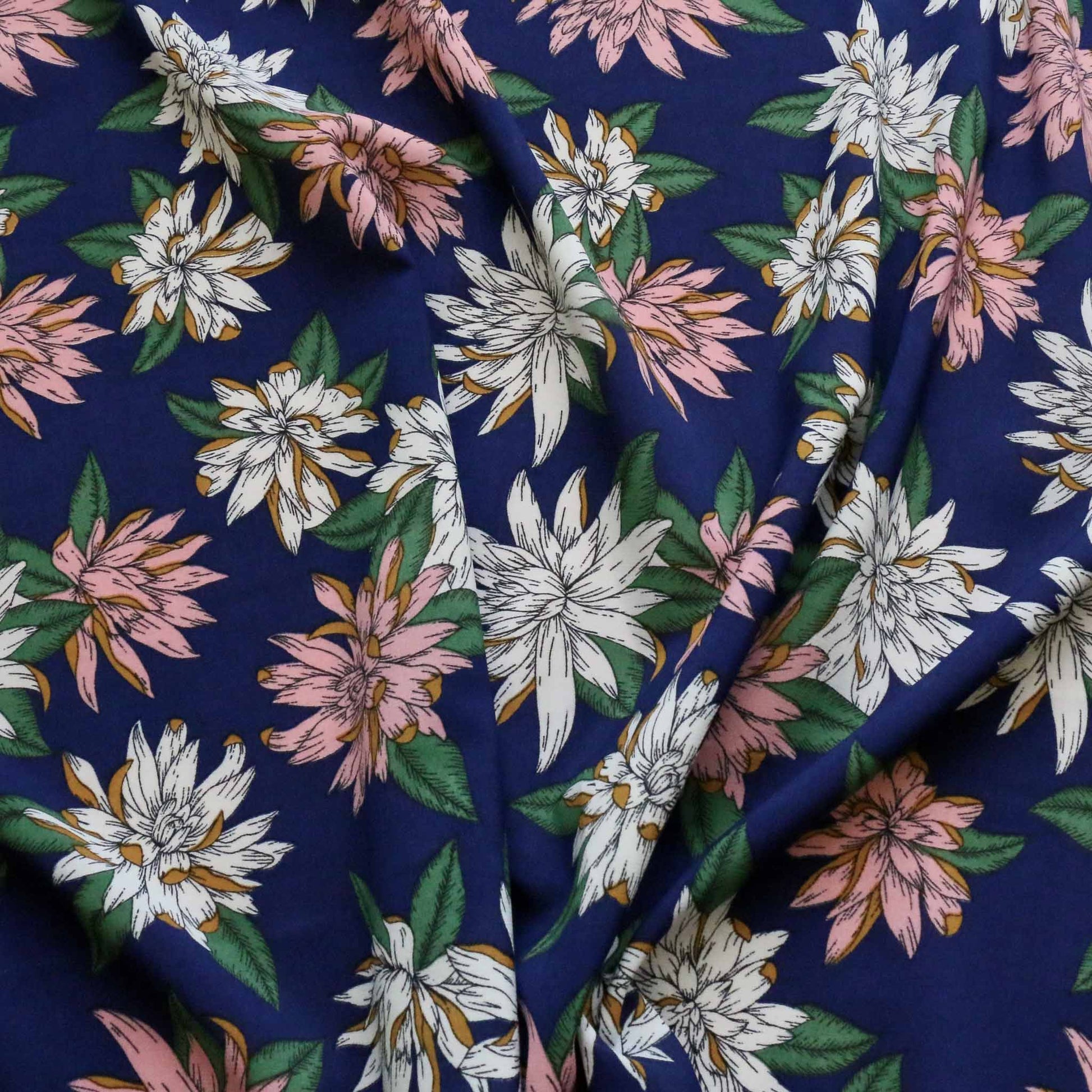 blue chiffon polyester synthetic dressmaking fabric with pink and white flower design print