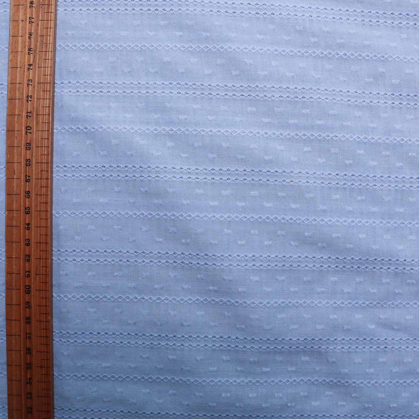 cotton lawn broad anglaise dressmaking fabric in pale blue