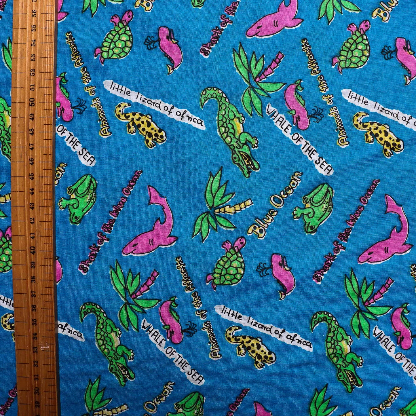 blue retro cotton poplin deadstock sustainable fabric with printed water animals pattern