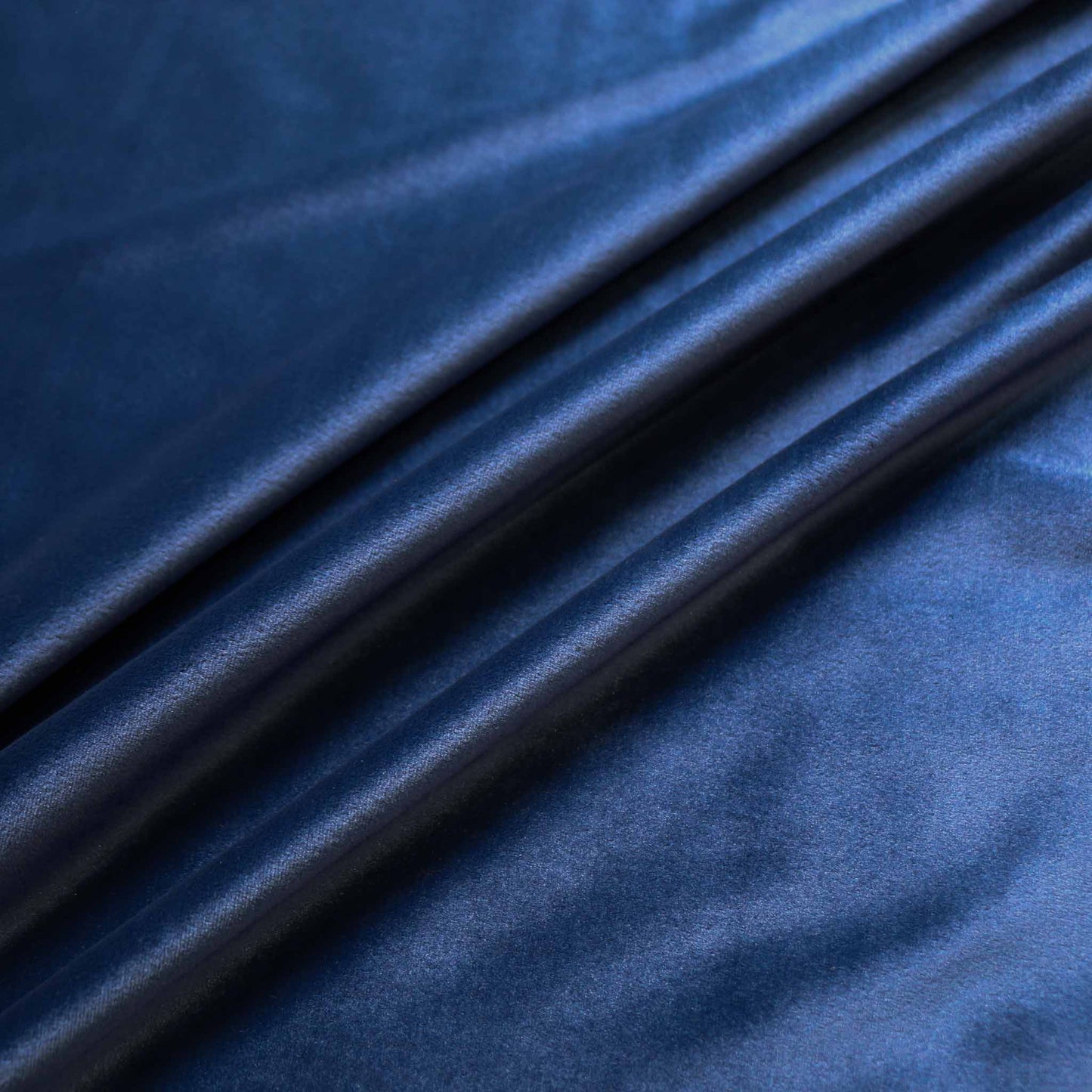 blue cotton blend stretchy velvet dressmaking fabric