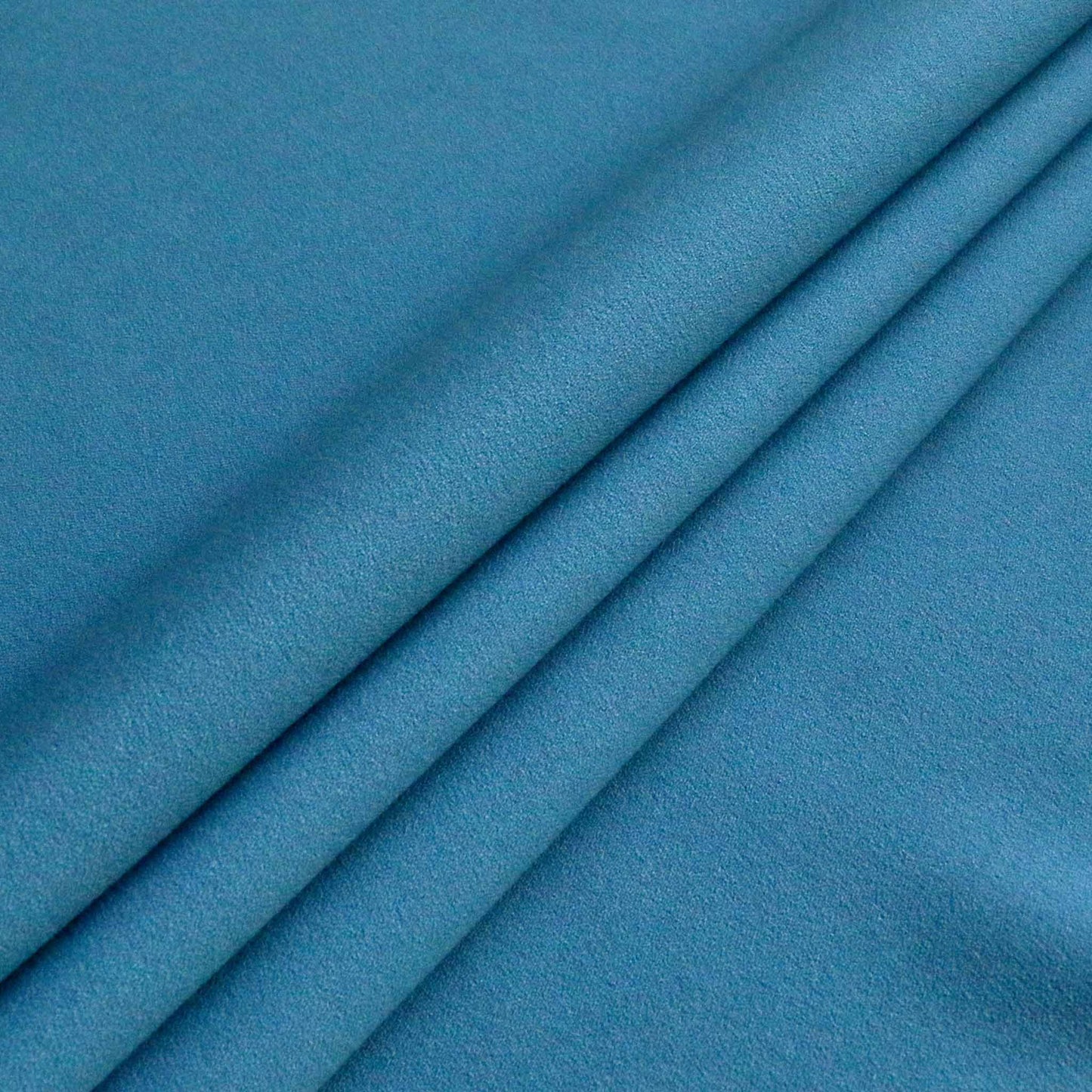 stretchy blue viscose crepe dressmaking fabric