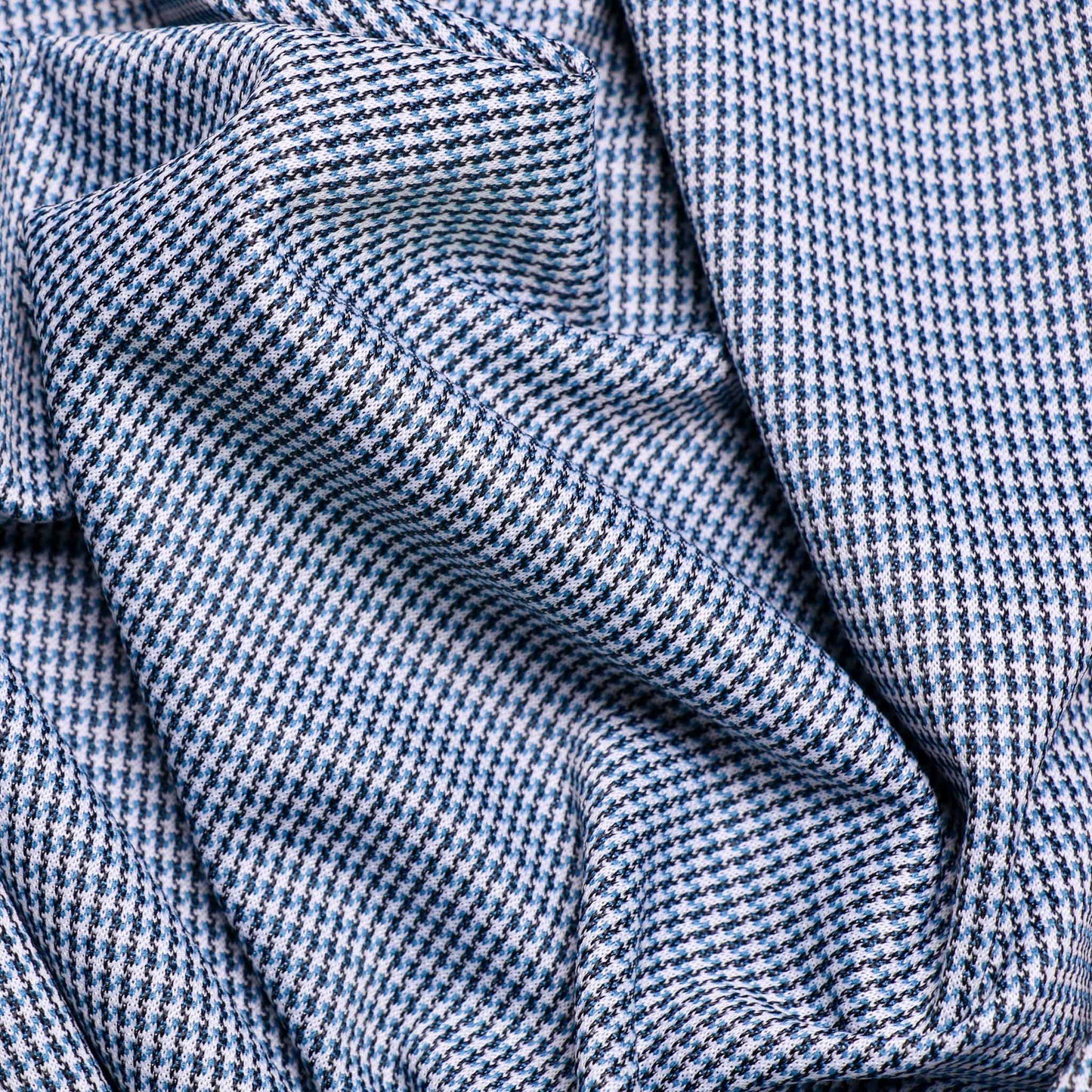 sustainable vintage jersey crimplene dressmaking fabric with houndstooth in blue and white