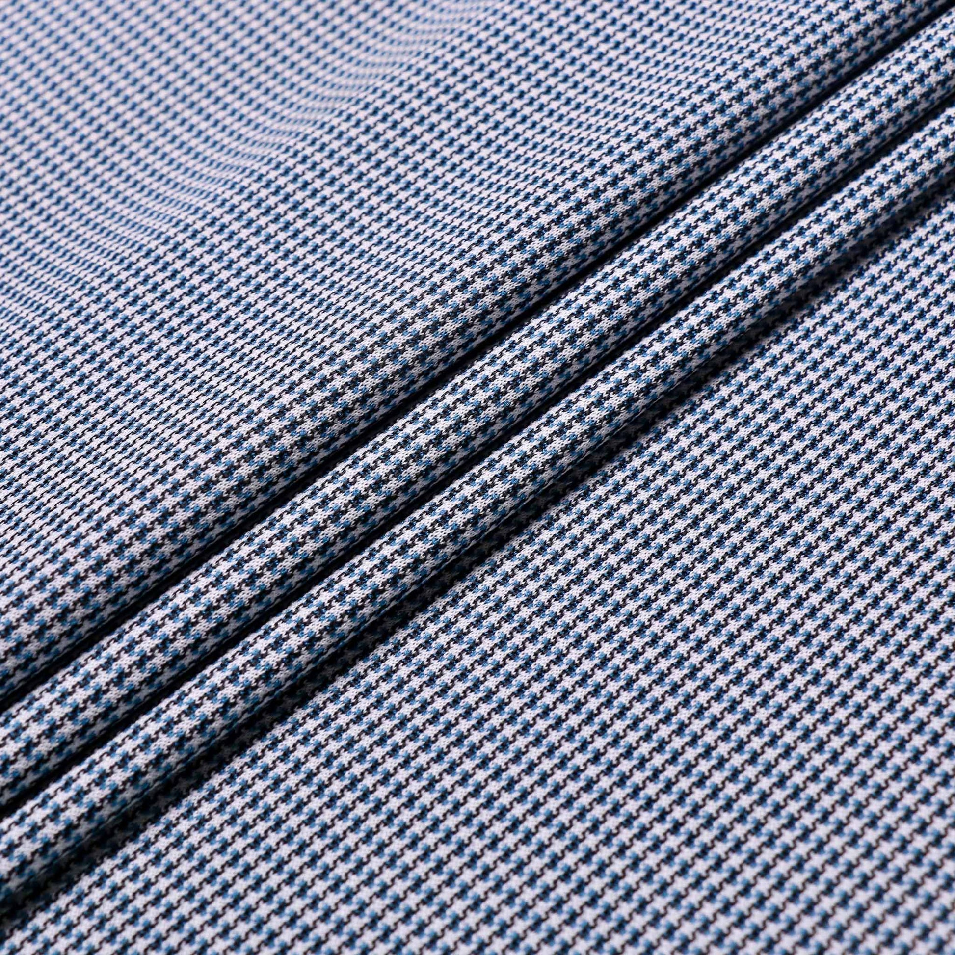 folded vintage eco friendly jersey dressmaking fabric in blue and white with houndstooth pattern