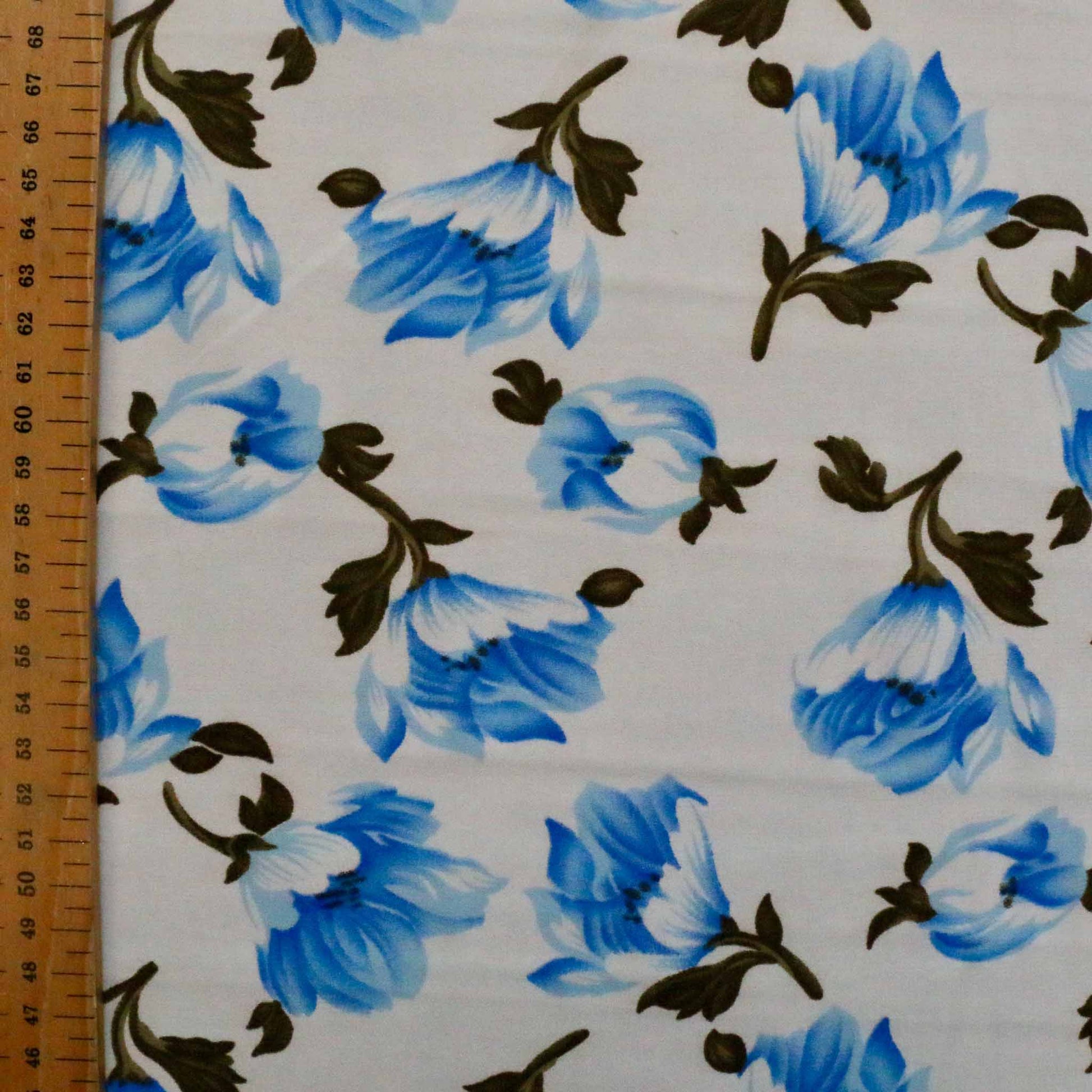 metre blue and white chiffon polyester dressmaking fabric with printed flowers