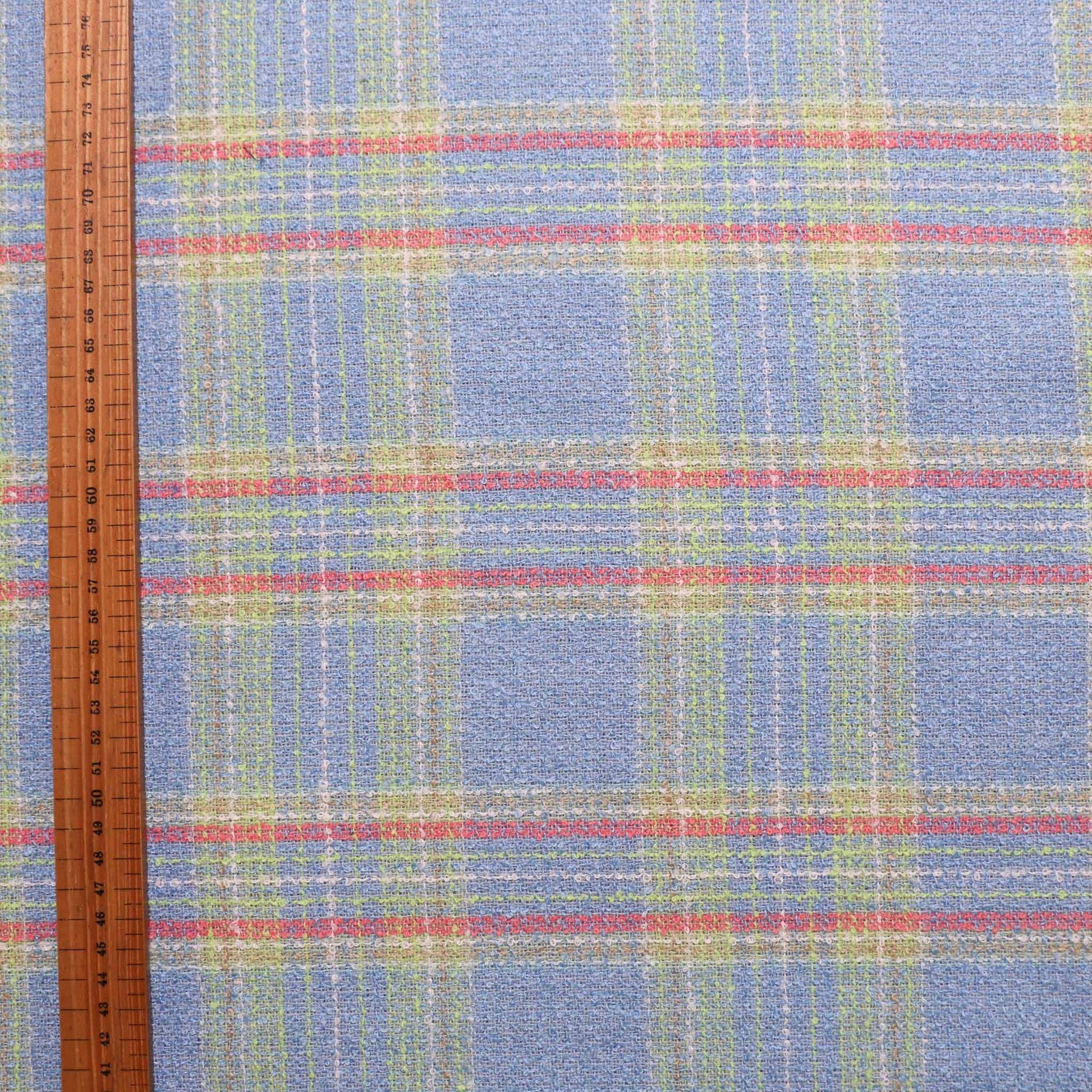pale blue lime green and pink wool blend boucle dressmaking fabric with check pattern