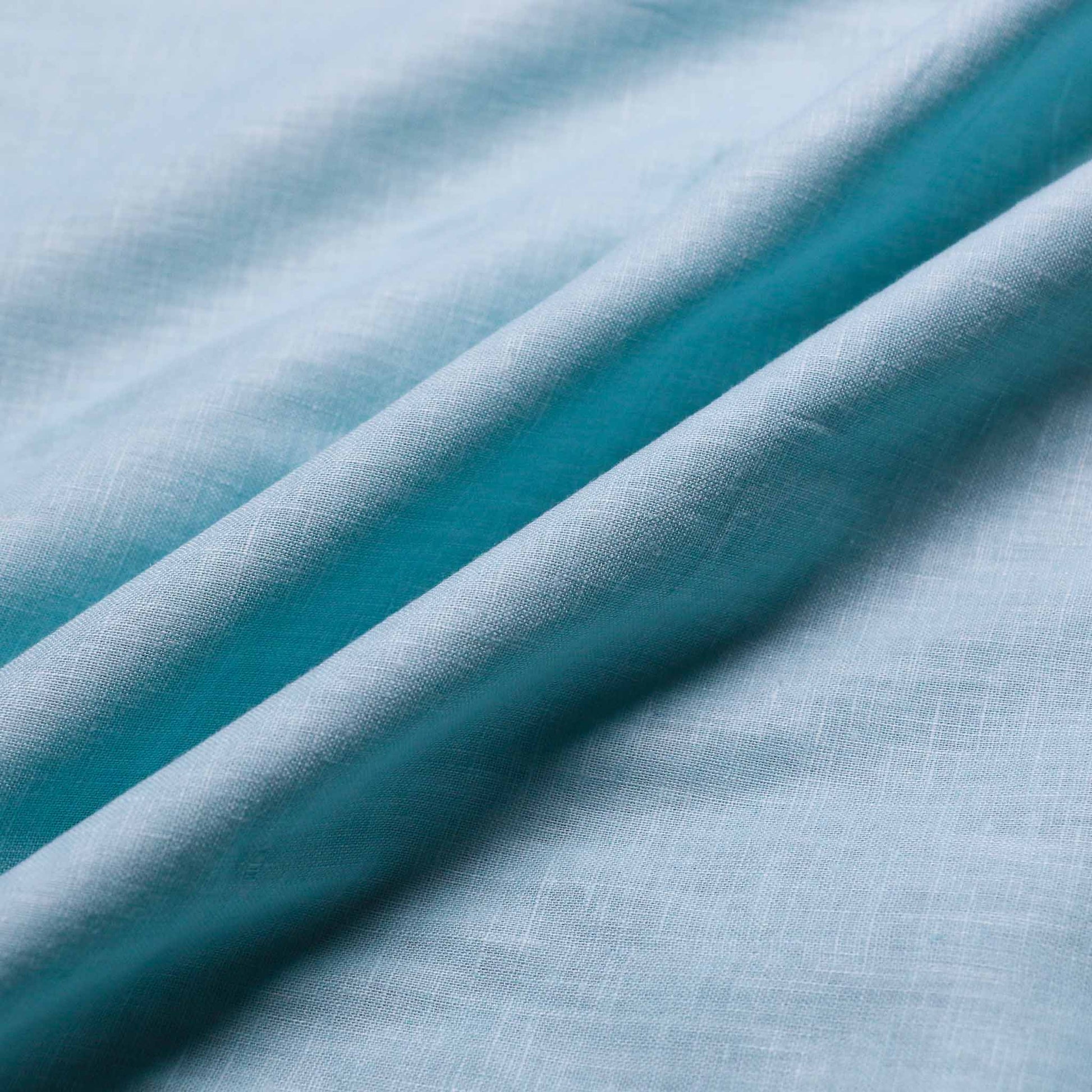 pale teal linen cotton dressmaking fabric